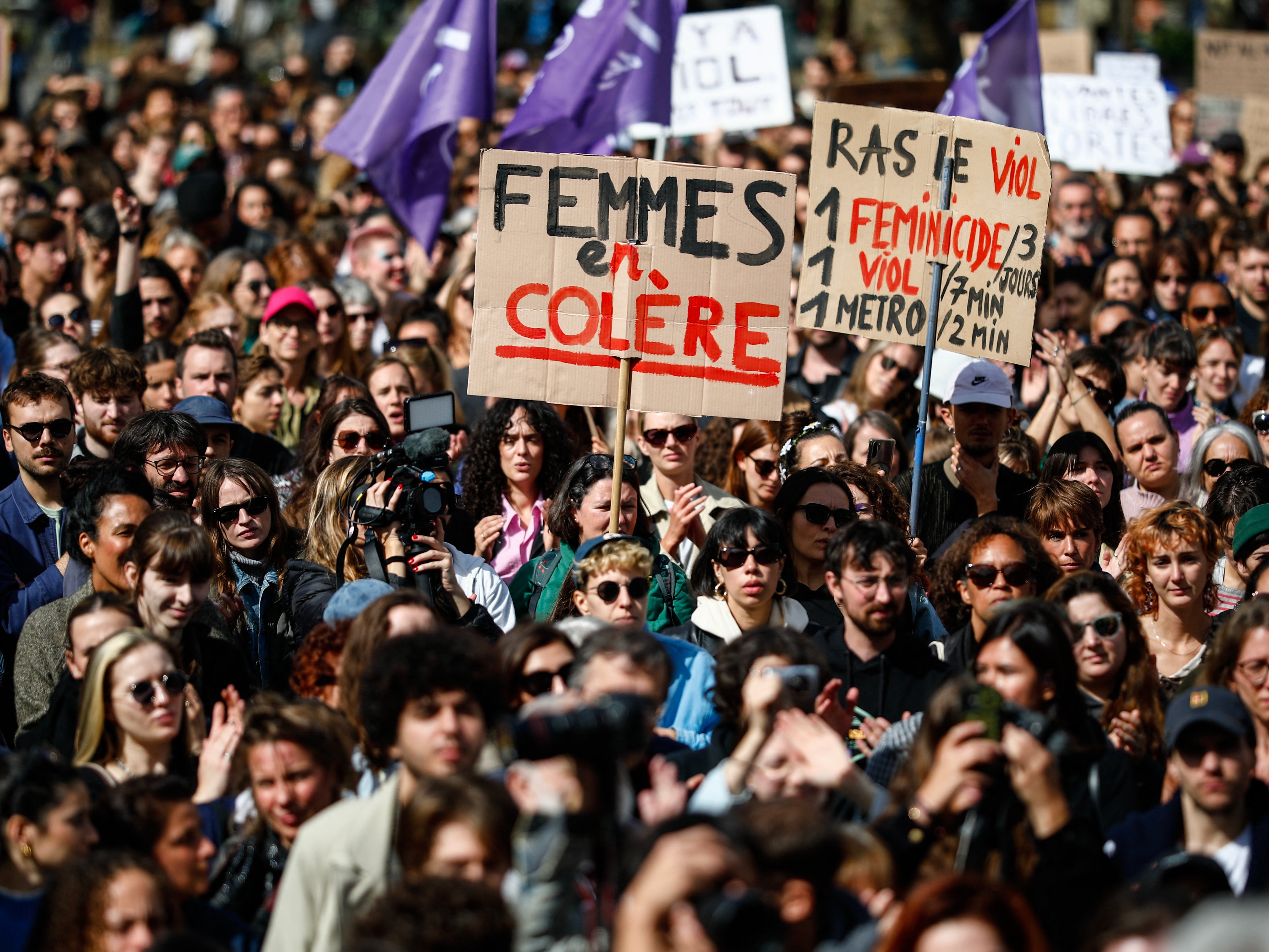 Crowds take part in a demonstration in support of Gisele