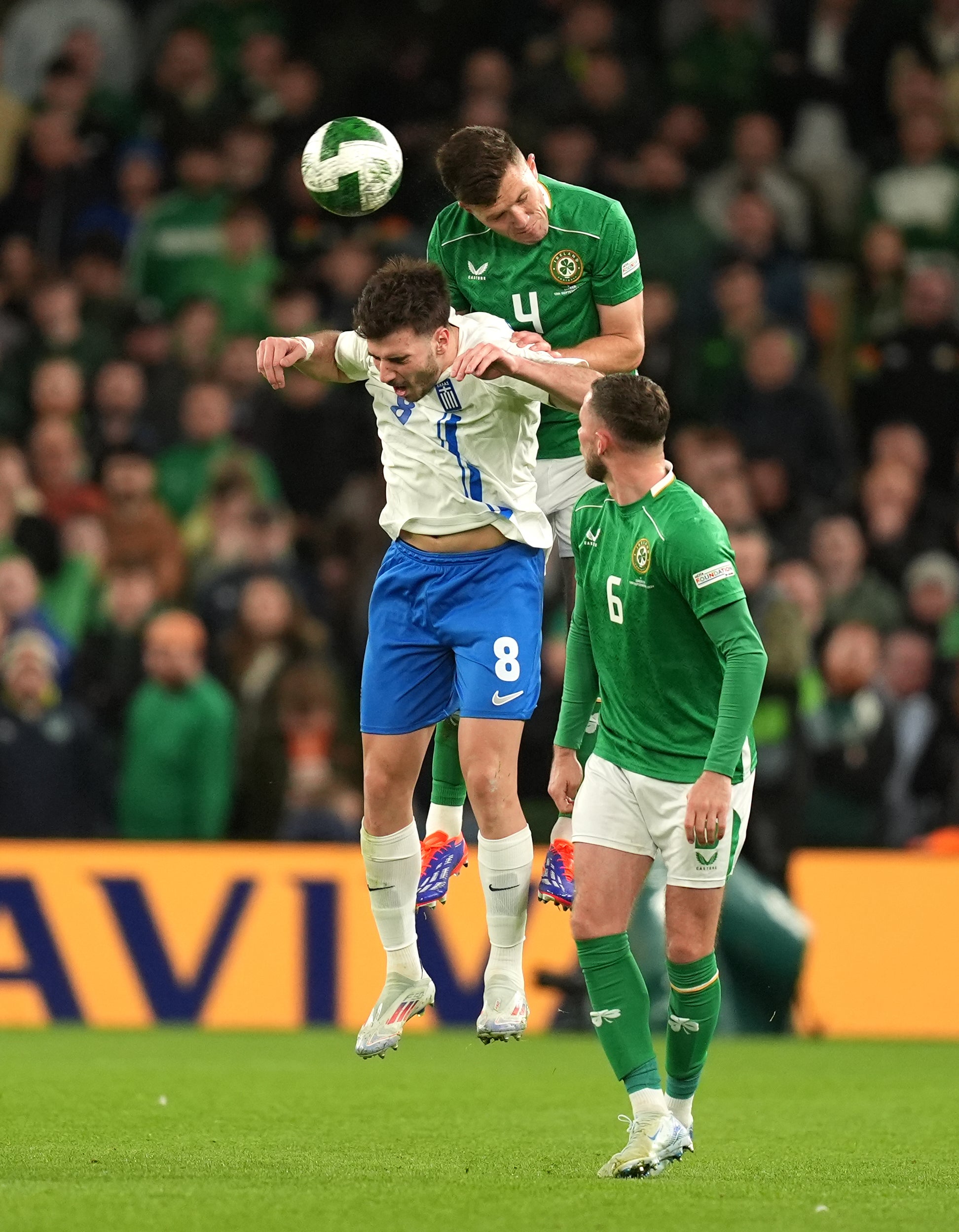 O’Shea playing for his country, heading the ball clear during a Nations League fixture against Greece in Dublin