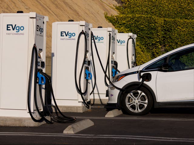 <p>EV chargers refresh a Chevy Bolt in Encintas, California, October 2023. According to reports, a used three-year-old EV now sells for 25 percent less than at the start of 2023 </p>