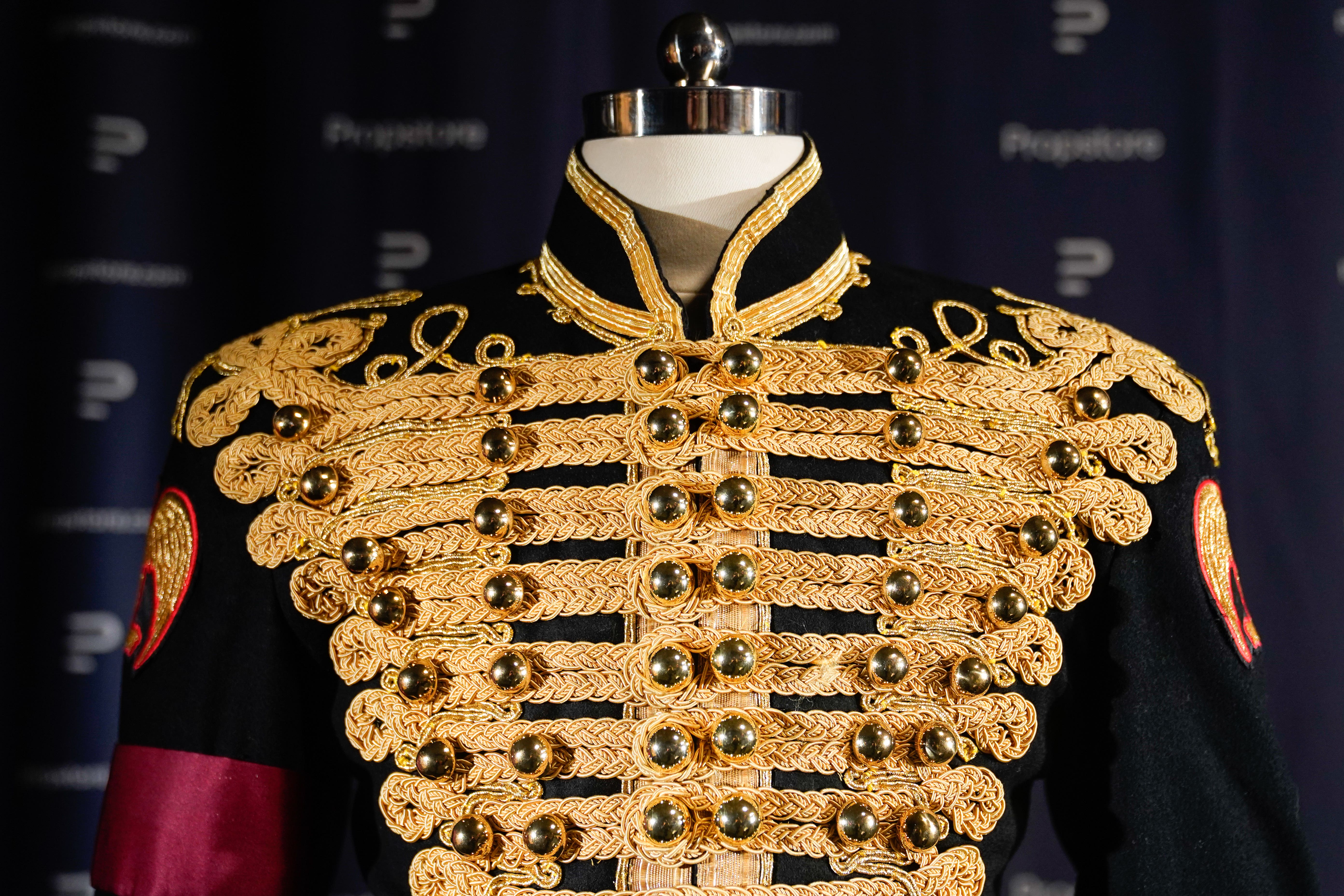 Michael Jackson’s black-and-gold military-style jacket is one of the items which will go under the hammer (Andrew Matthews/PA)