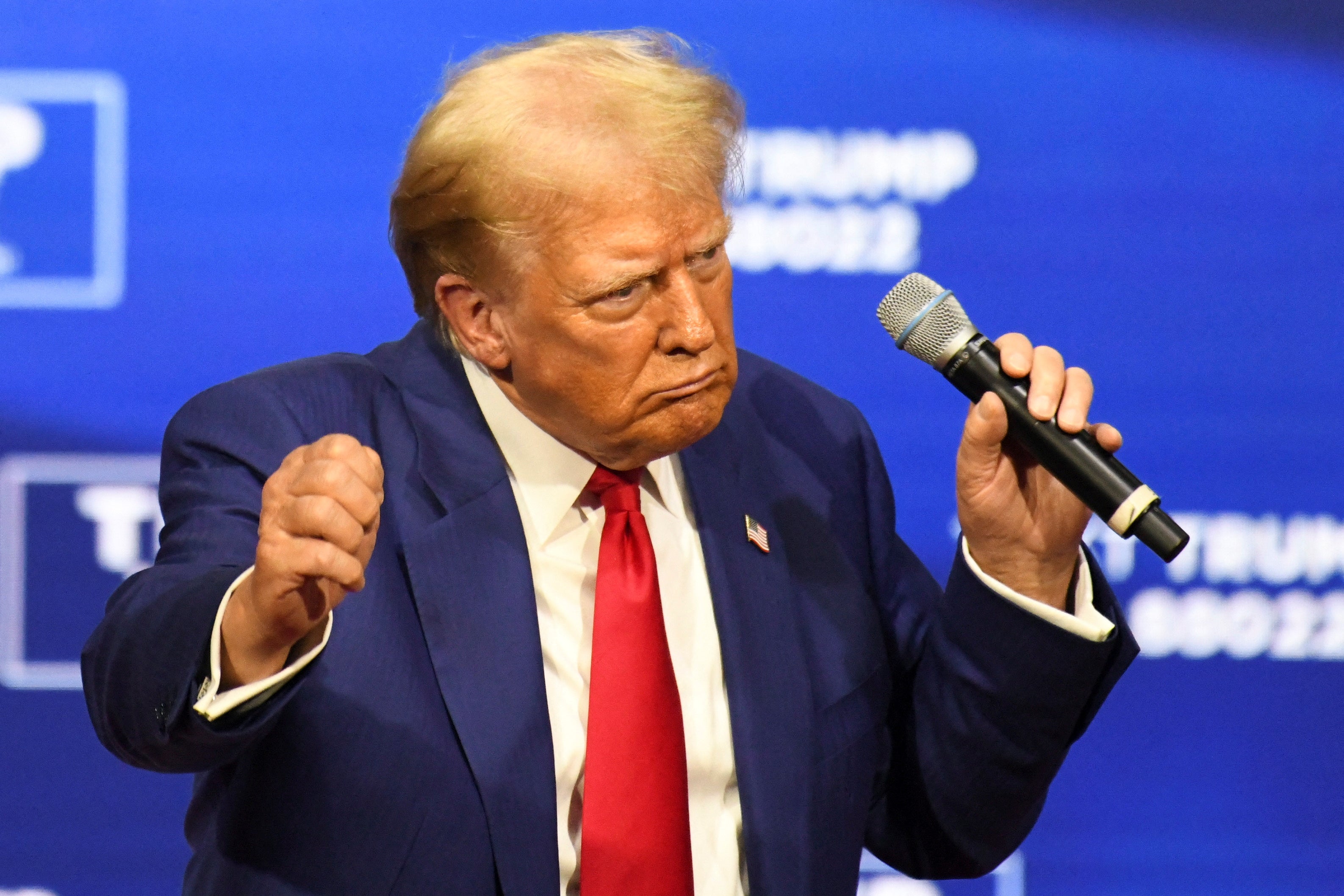 Republican presidential nominee former U.S. President Donald Trump dances during a town hall campaign event