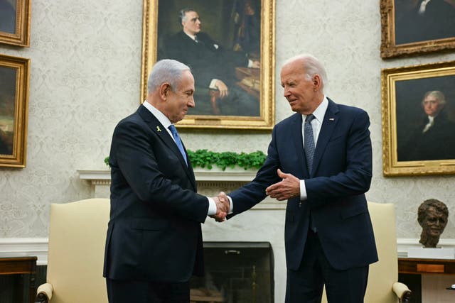 <p>US president Joe Biden shakes hands with Israeli prime minister Benjamin Netanyahu during July’s meeting in the Oval Office</p>