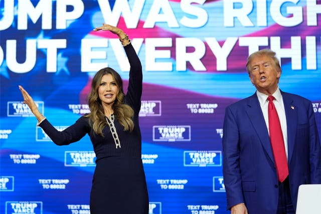 <p>Trump danced alongside South Dakota Governor Kristi Noem for nearly 40 minutes at a town hall after he said he didn’t want to take any more questions </p>