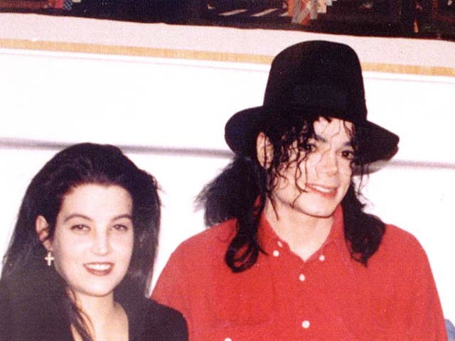 <p>Lisa Marie Presley with Michael Jackson in 1994</p>