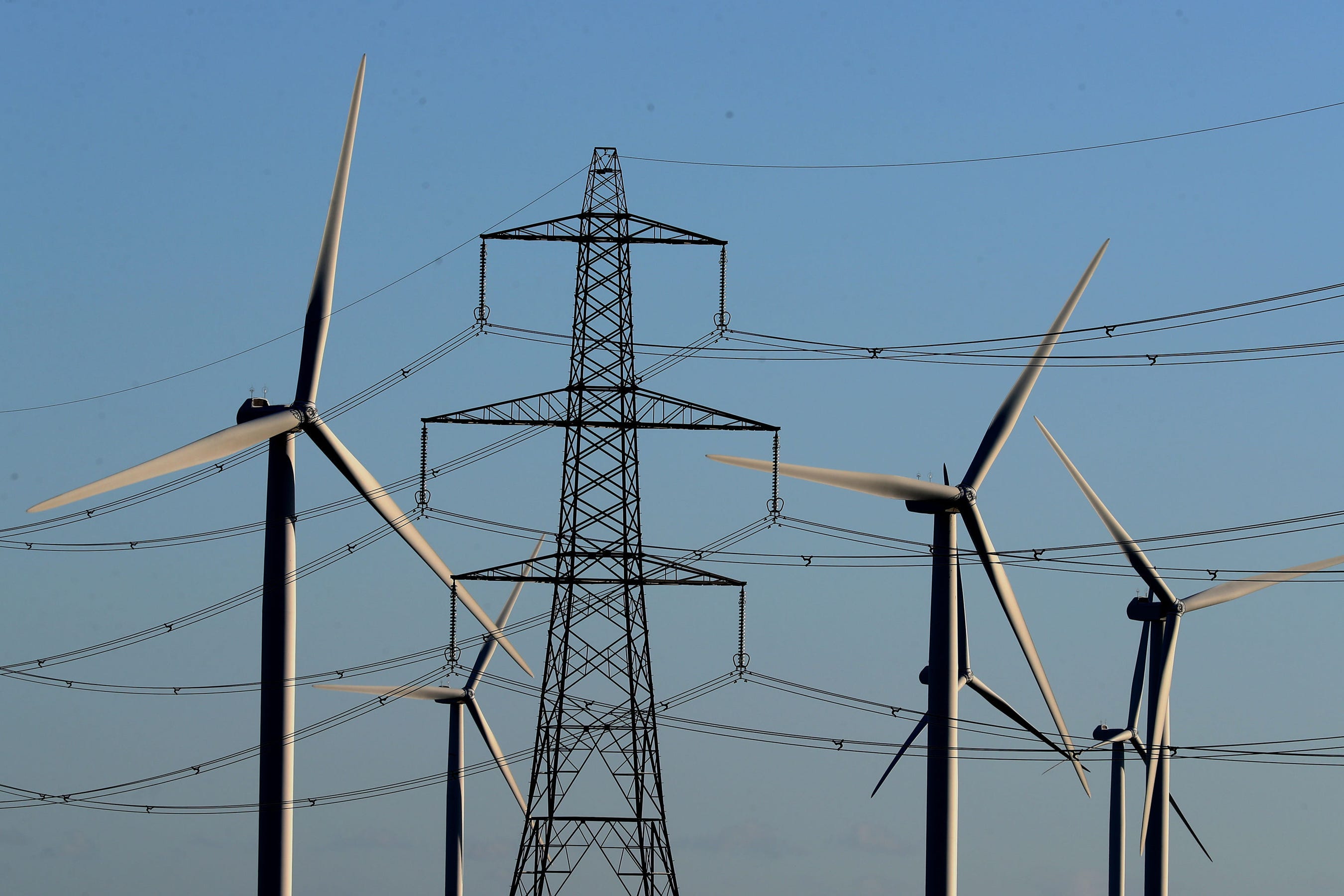 There is a need to build power infrastructure at speed, including pylons, communities have been warned (Gareth Fuller/PA)