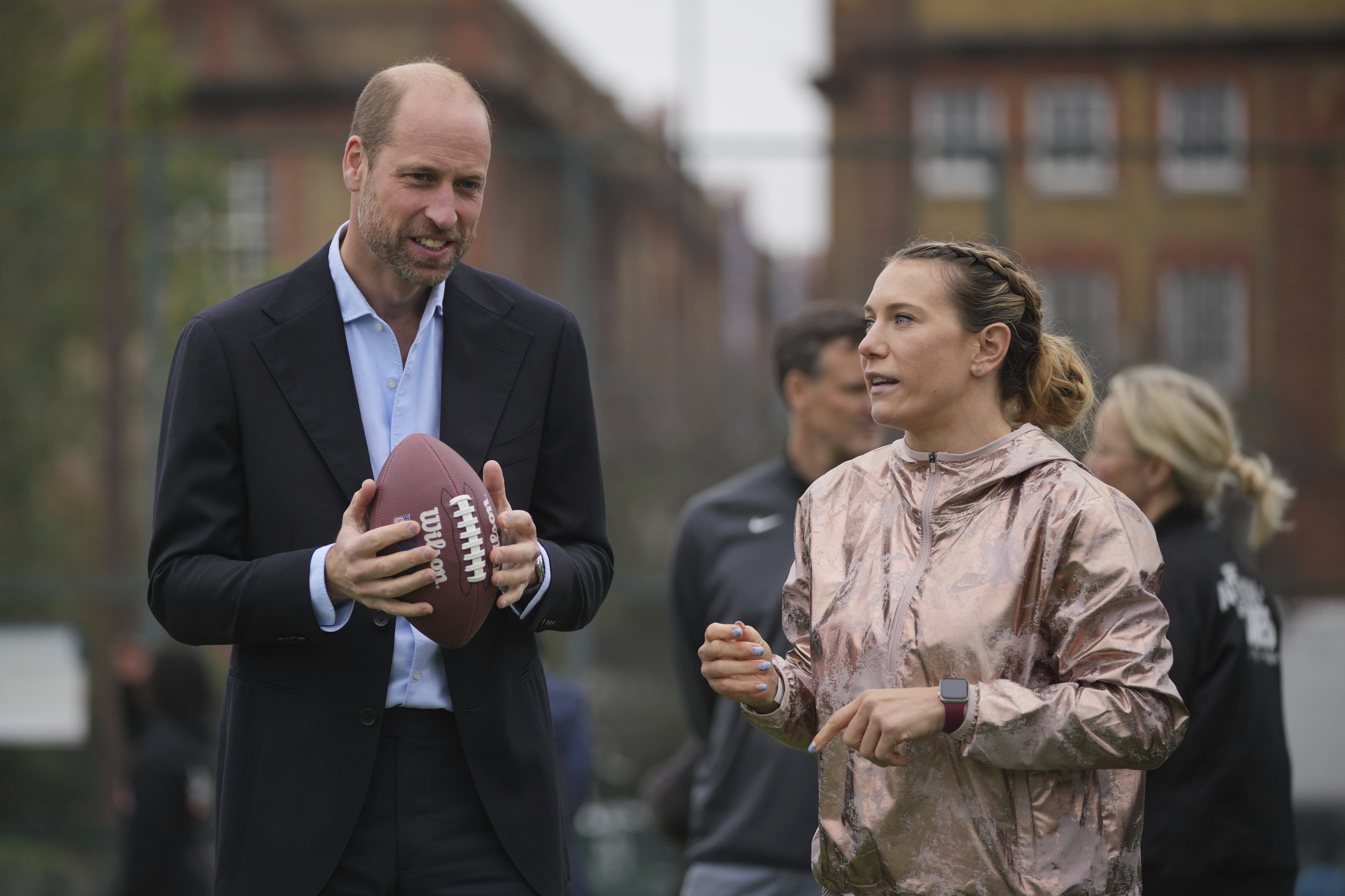 Phoebe Schecter (right) has become a prominent NFL personality in the United Kingdom