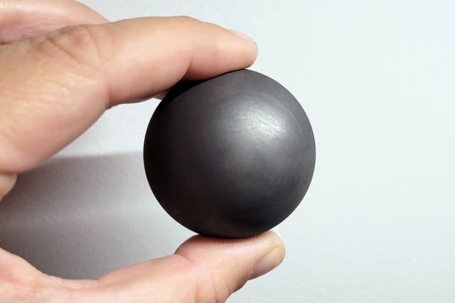 <p>A golf-ball-sized fuel pebble from Kairos Power, a nuclear energy startup based in California that secured a deal with Google in October 2024 </p>