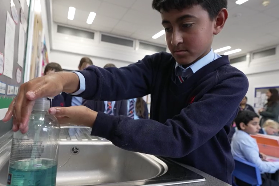 A hand-washing lesson was streamed into school assembly halls from De Montfort University (Richard McCarthy/PA)