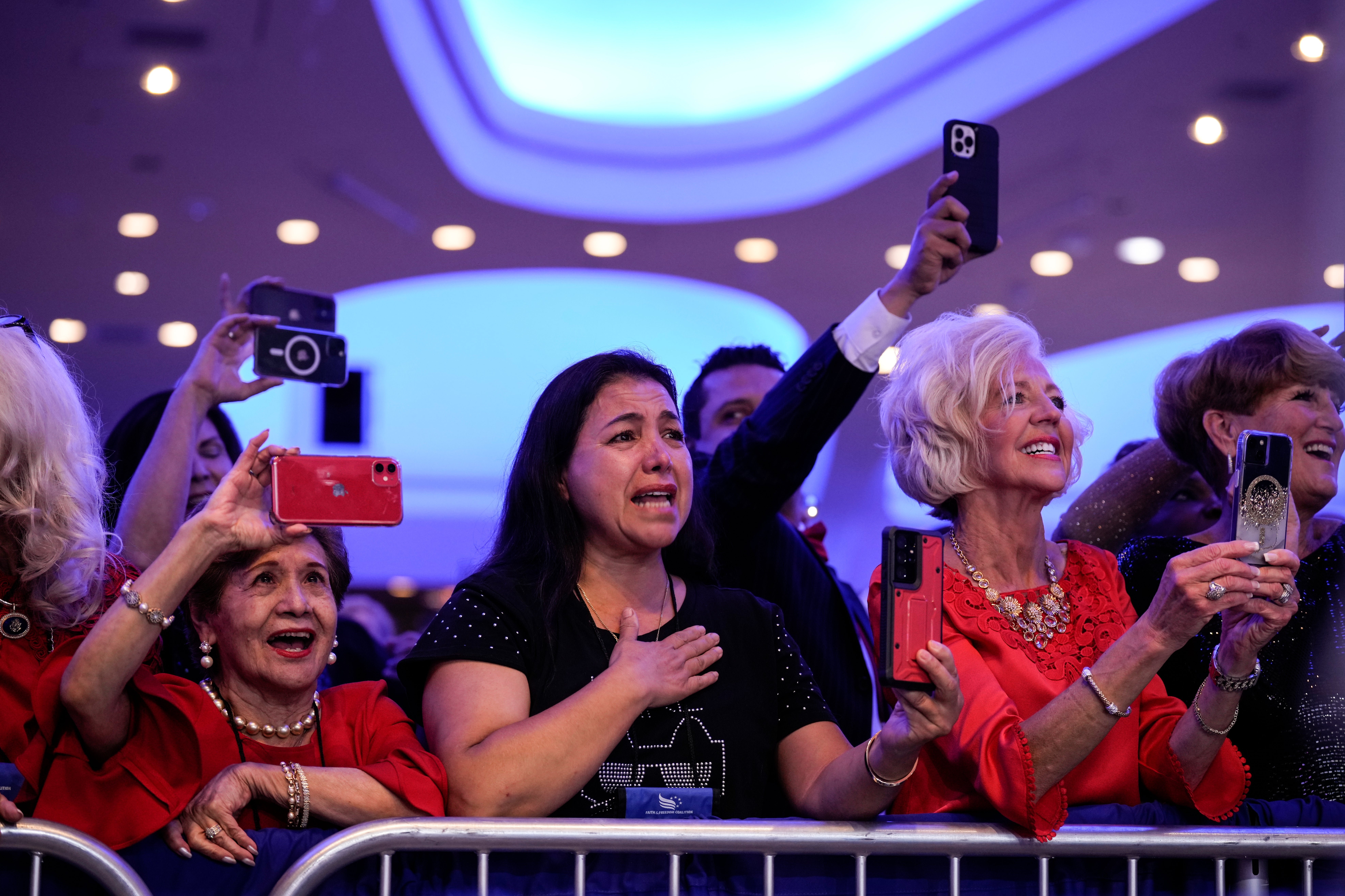 Supporters cry and cheer for Donald Trump as he arrives at the Faith and Freedom convention in Washington DC on June 24.