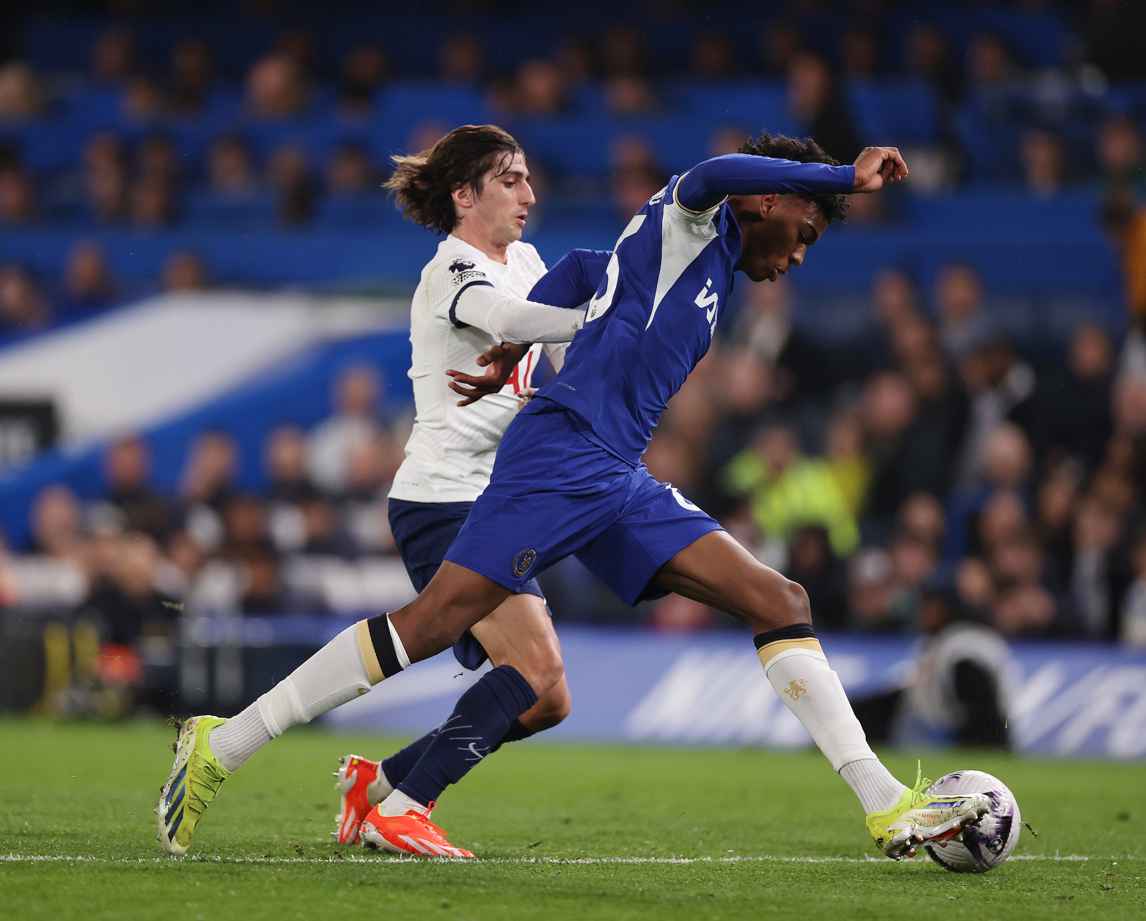 Joshua Acheampong in action on his Chelsea debut against Tottenham.