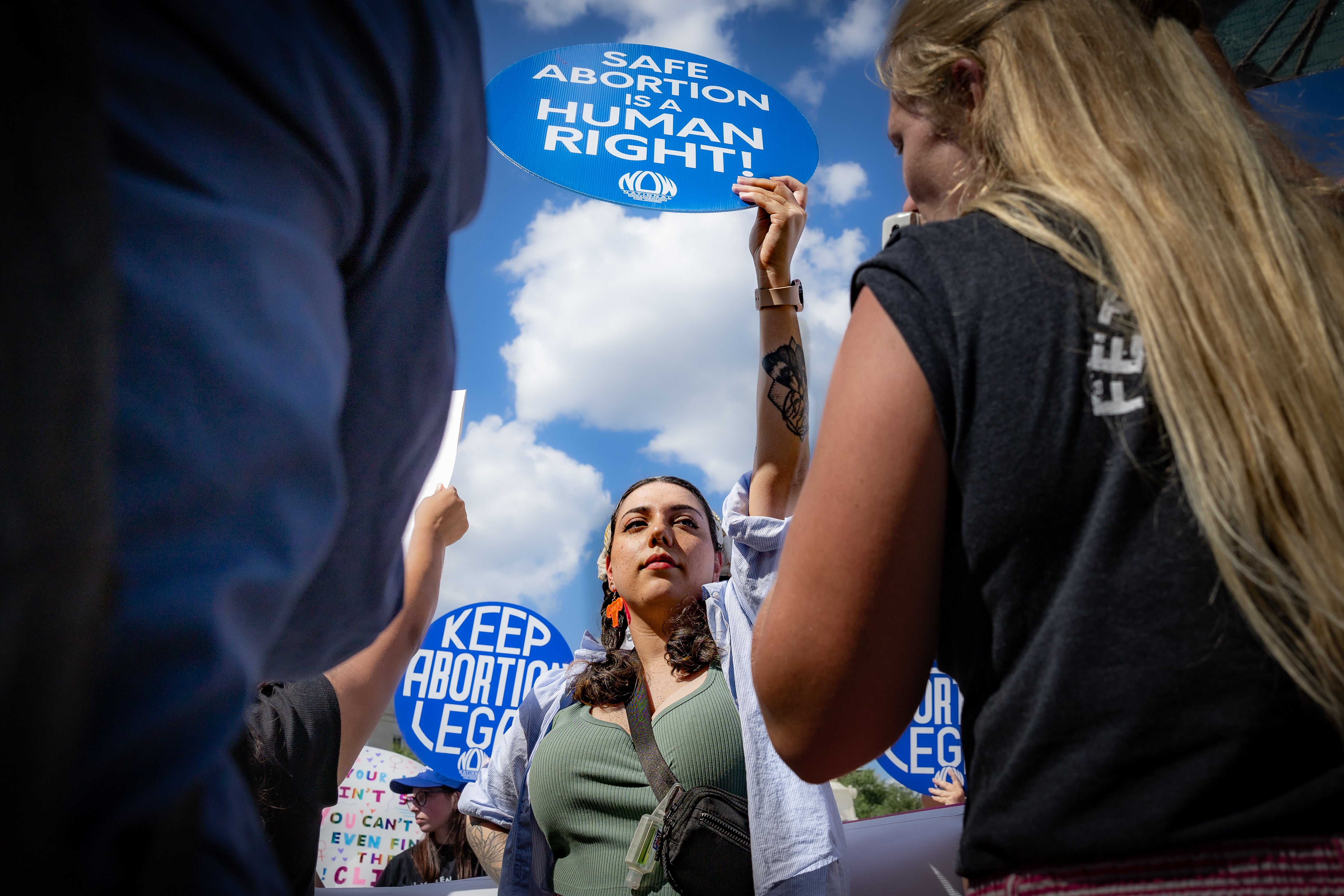 Abortion rights demonstrators rally outside the Supreme Court.