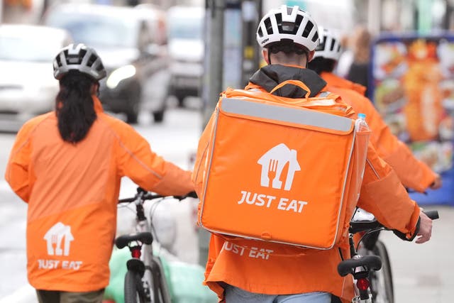 Food delivery giant Just Eat Takeaway has seen tough trading in the US weigh down on the wider group and offset a better performance in the UK and Europe (PA)