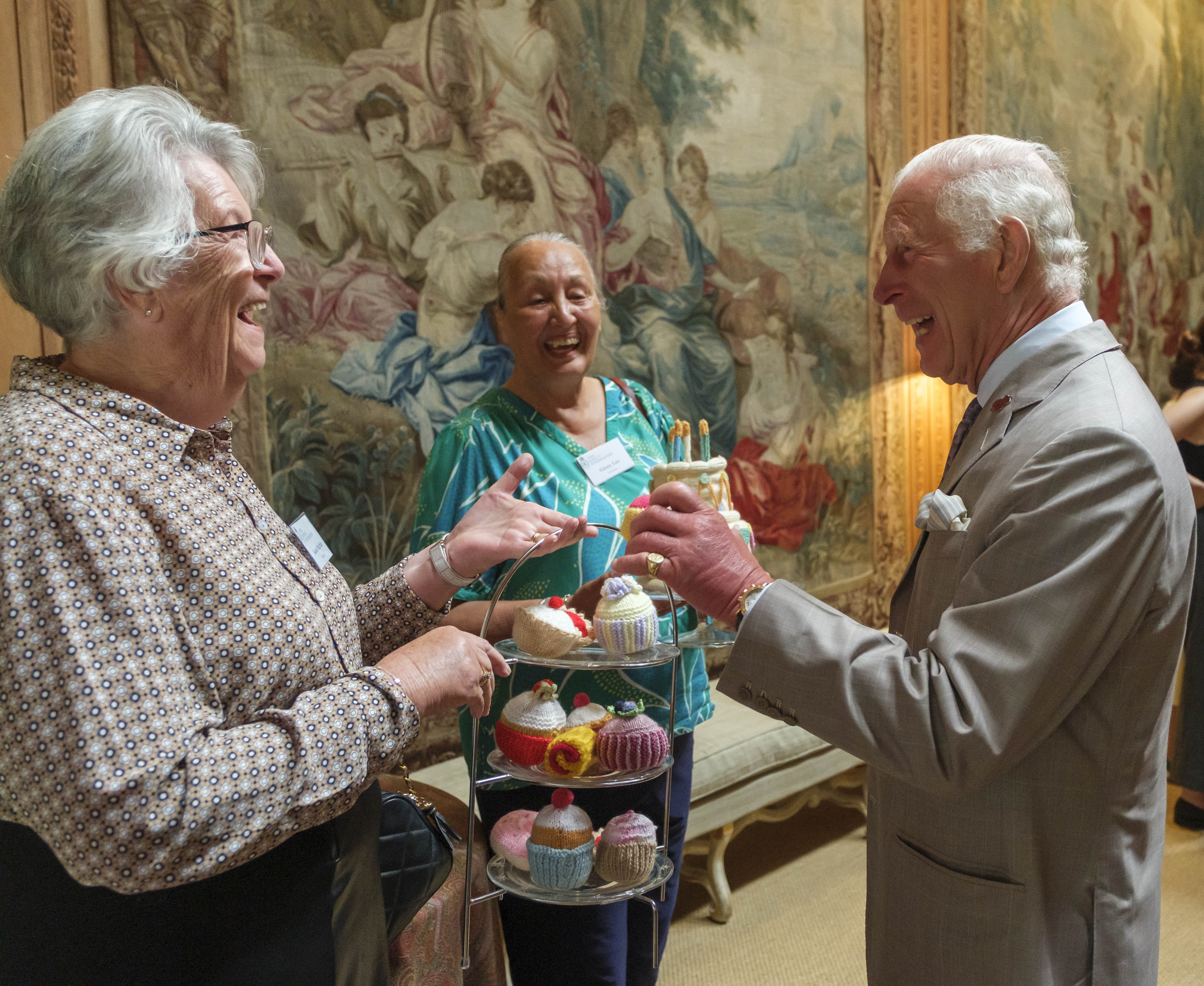 The monarch was delighted by the knitted cakes.