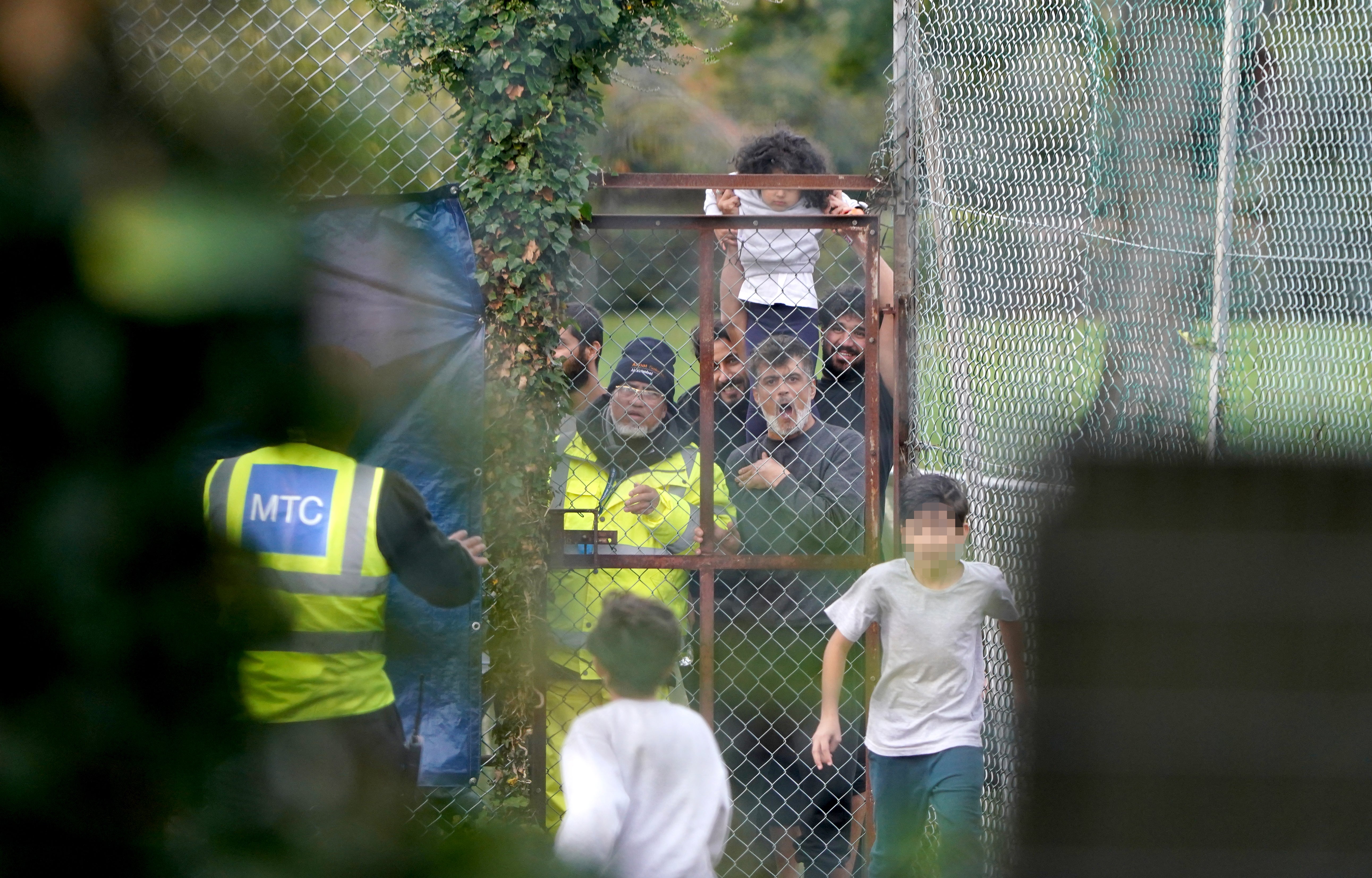 Asylum seekers pictured at Manston detention centre at the height of the crisis in 2022