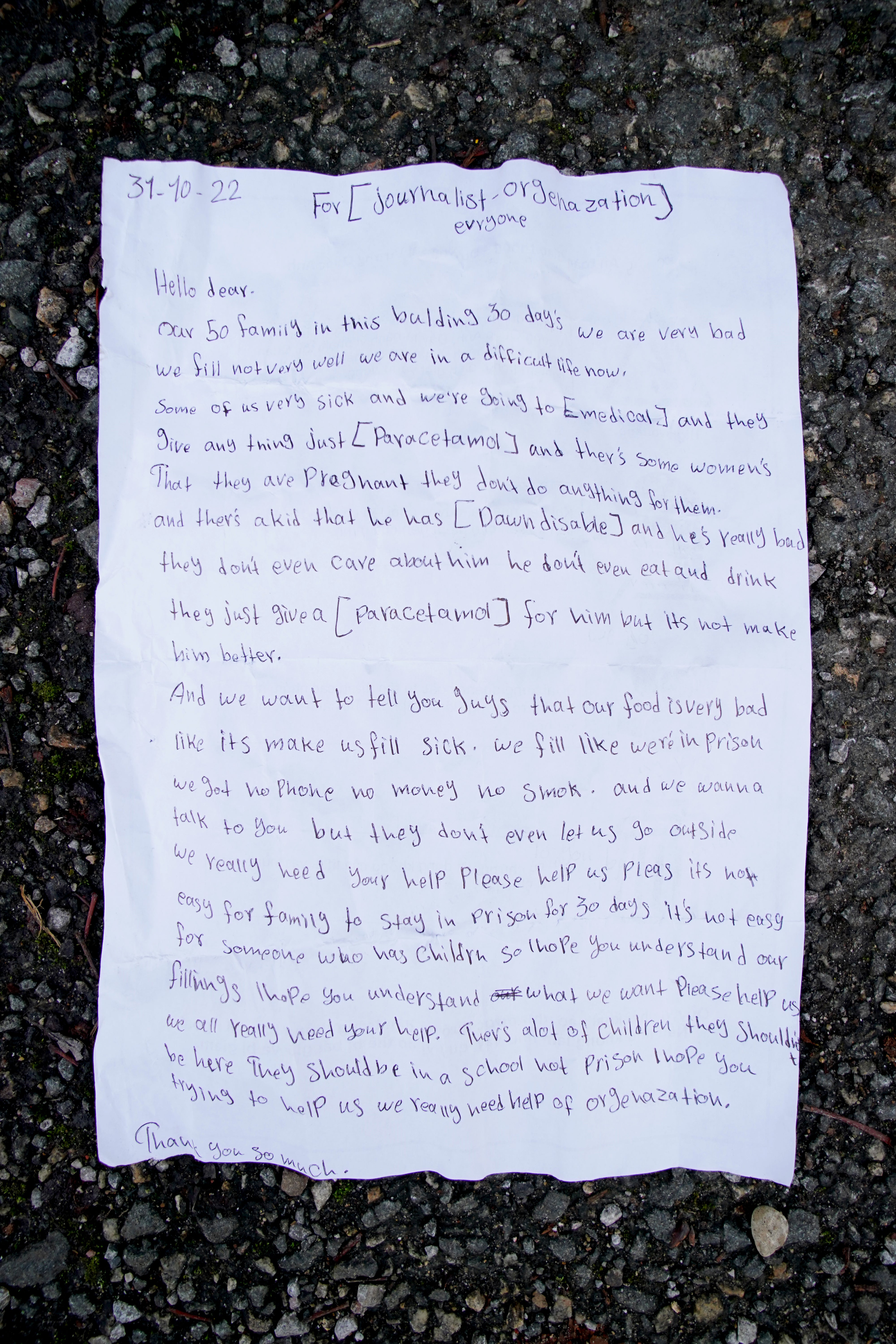 A letter thrown by a young girl over the fence at the Manston immigration short-term holding facility during the height of the crisis in November 2022