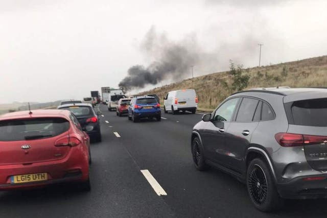 Photographs on social media showed a plume of black smoke rising into the sky above the M6 motorway (Chris Isles/PA)