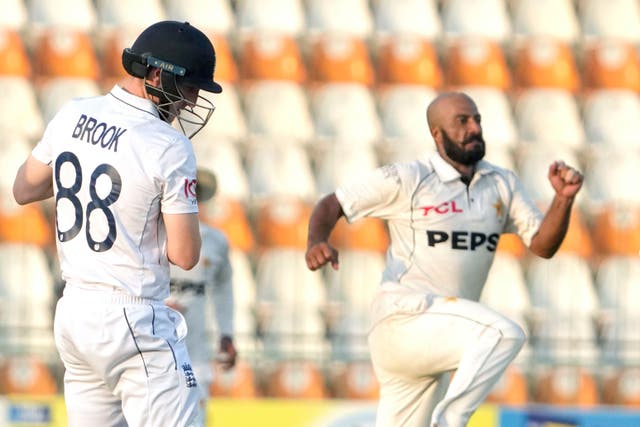 Harry Brook, left, reacts after being bowled by Sajid Khan (KM Chadary/AP)