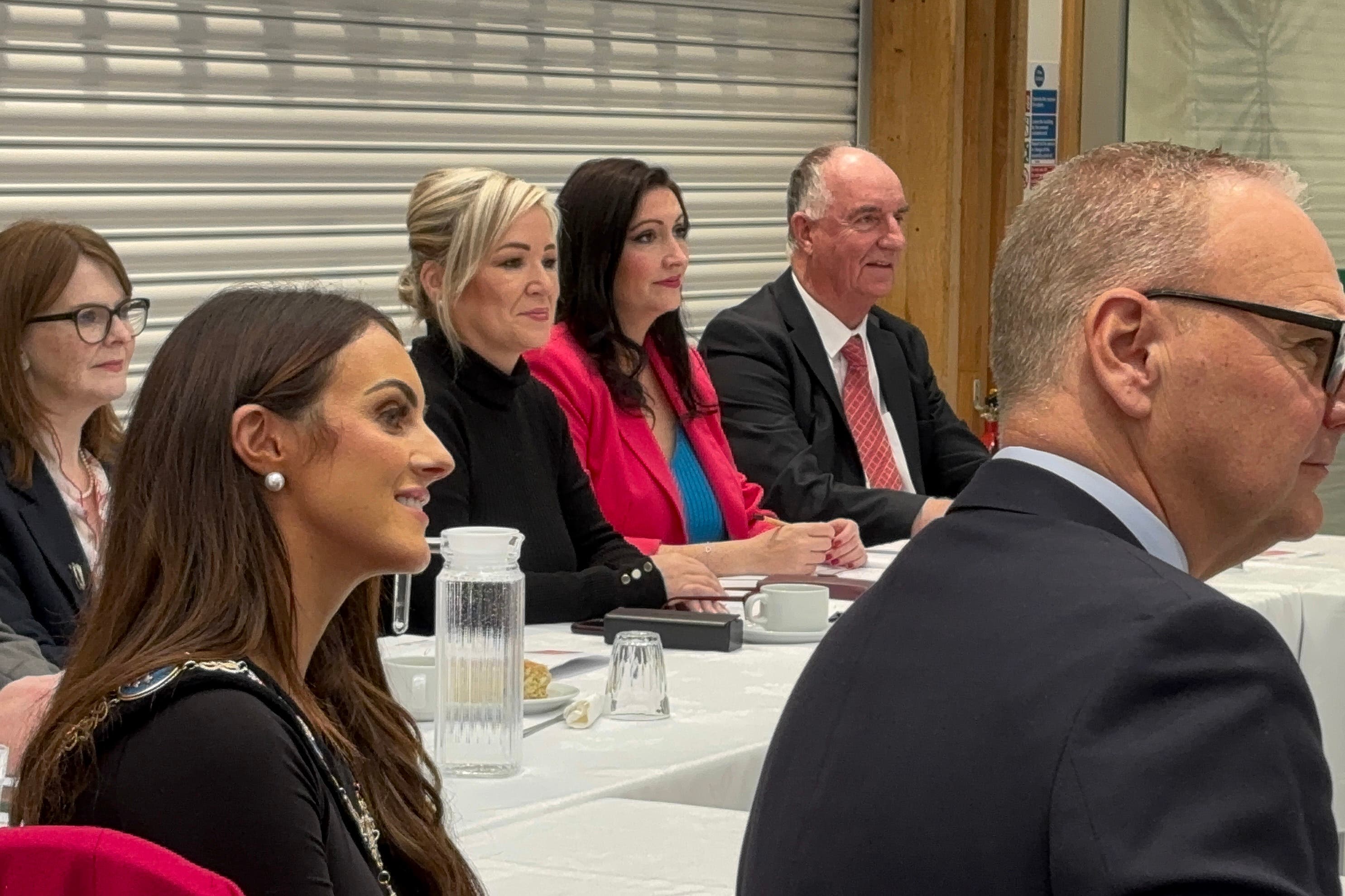 Stormont Finance Minister Caoimhe Archibald, First Minister Michelle O’Neill and deputy First Minister Emma Little-Pengelly attending the event in Dungannon (Rebecca Black/PA)