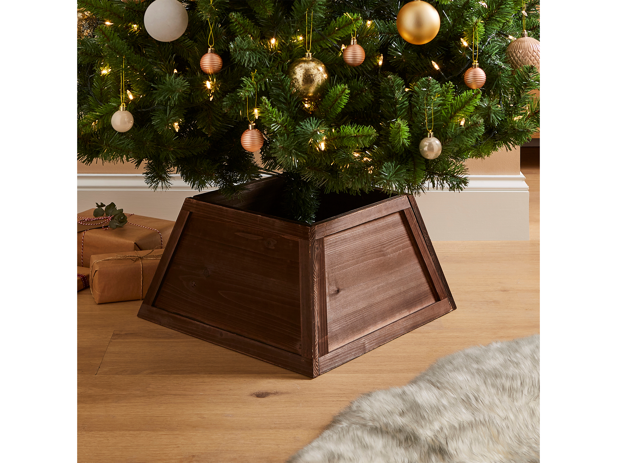 Best Christmas tree stands IndyBest review Dunelm 50cm wooden walnut folding tree skirt