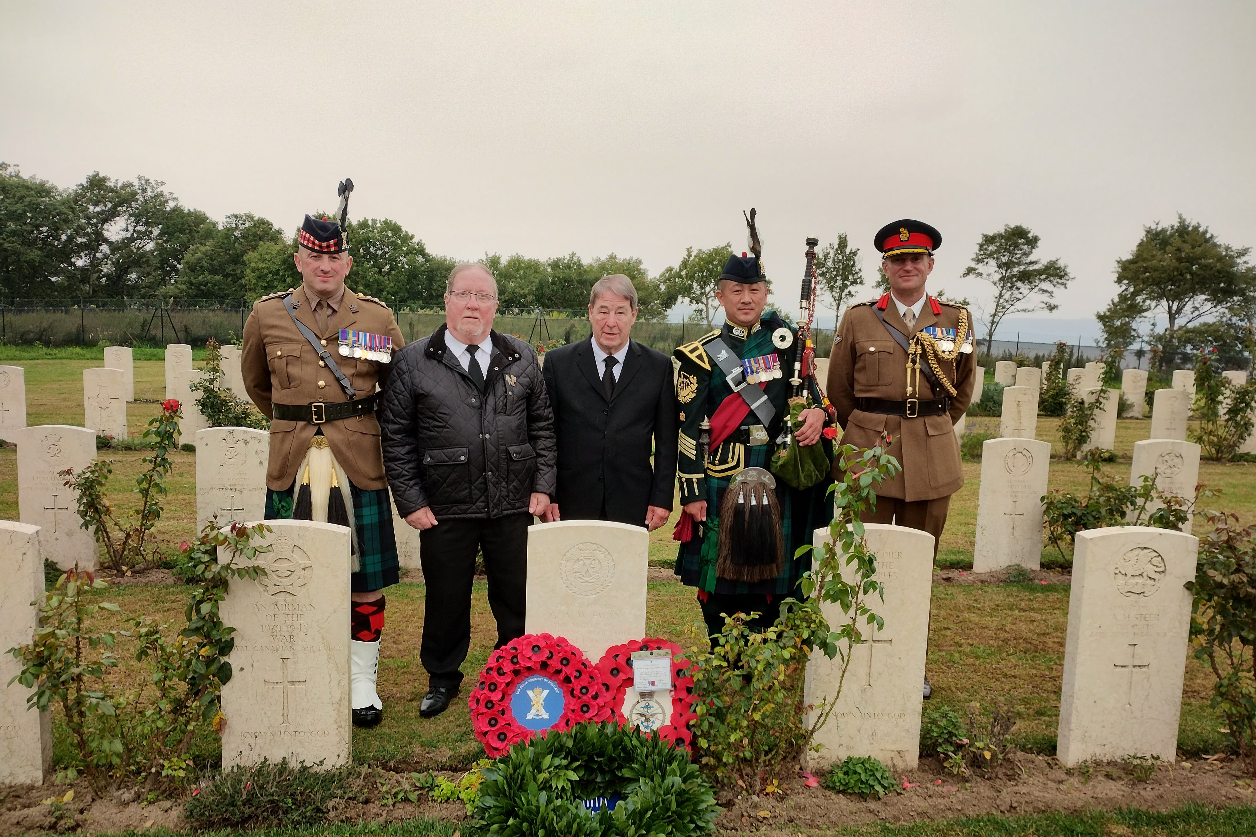 The grave of Private Ewan, who died in Italy in the Second World War, has been identified and rededicated 80 years after his death (Crown Copyright/PA)