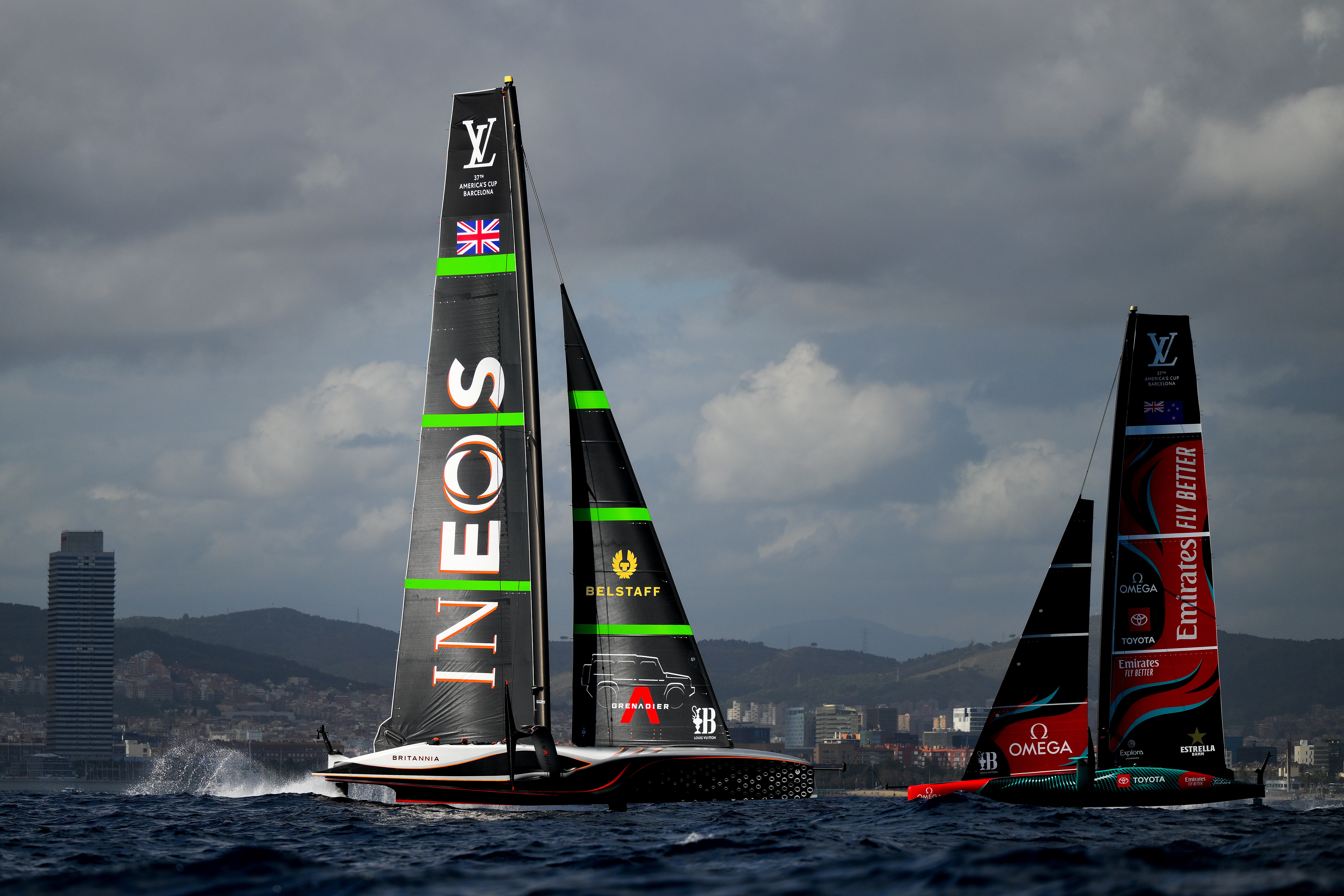 Ineos Britannia, left, battling Emirates New Zealand in race six in Barcelona