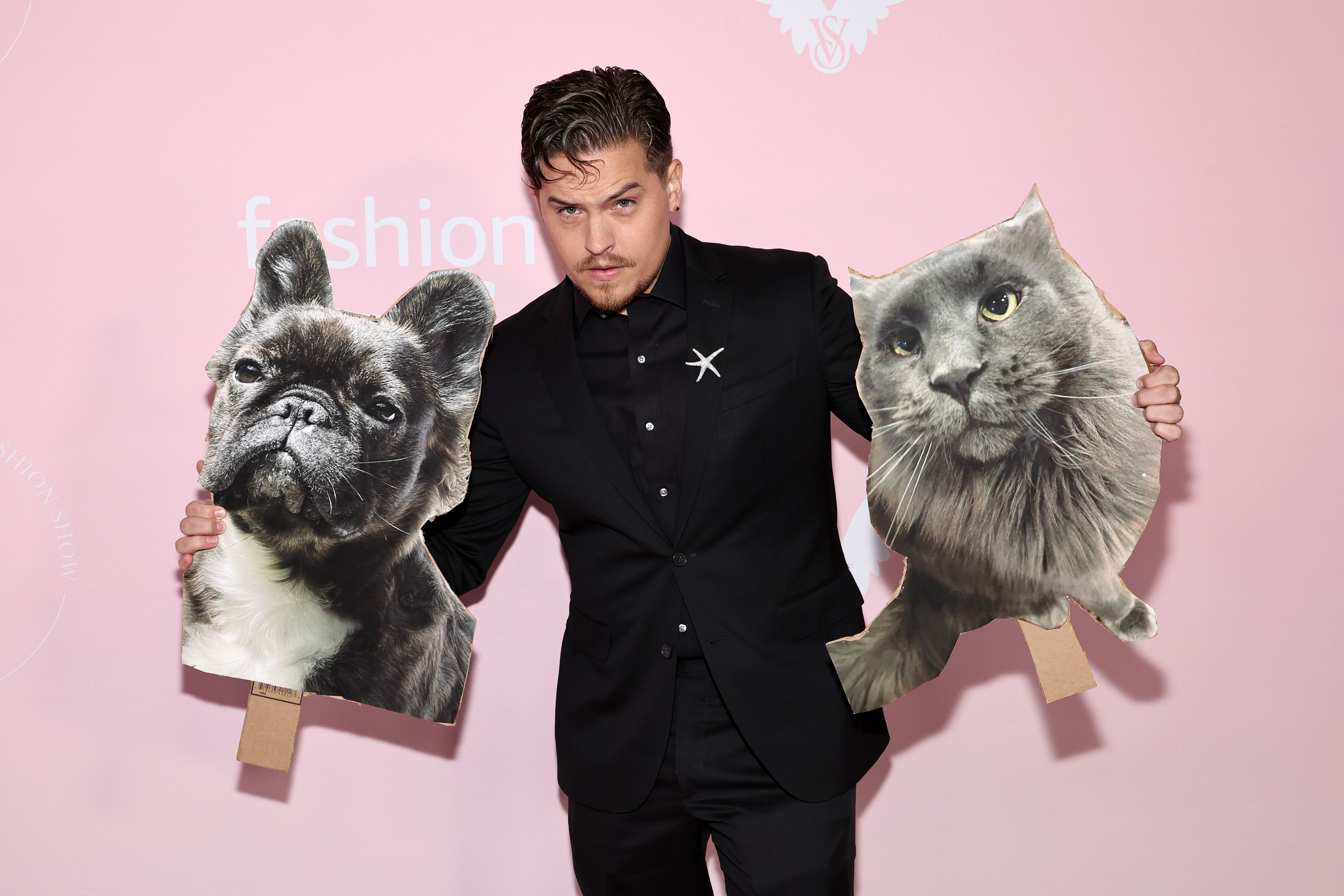 The former Disney Channel star brought cardboard cutouts of their pets’ faces