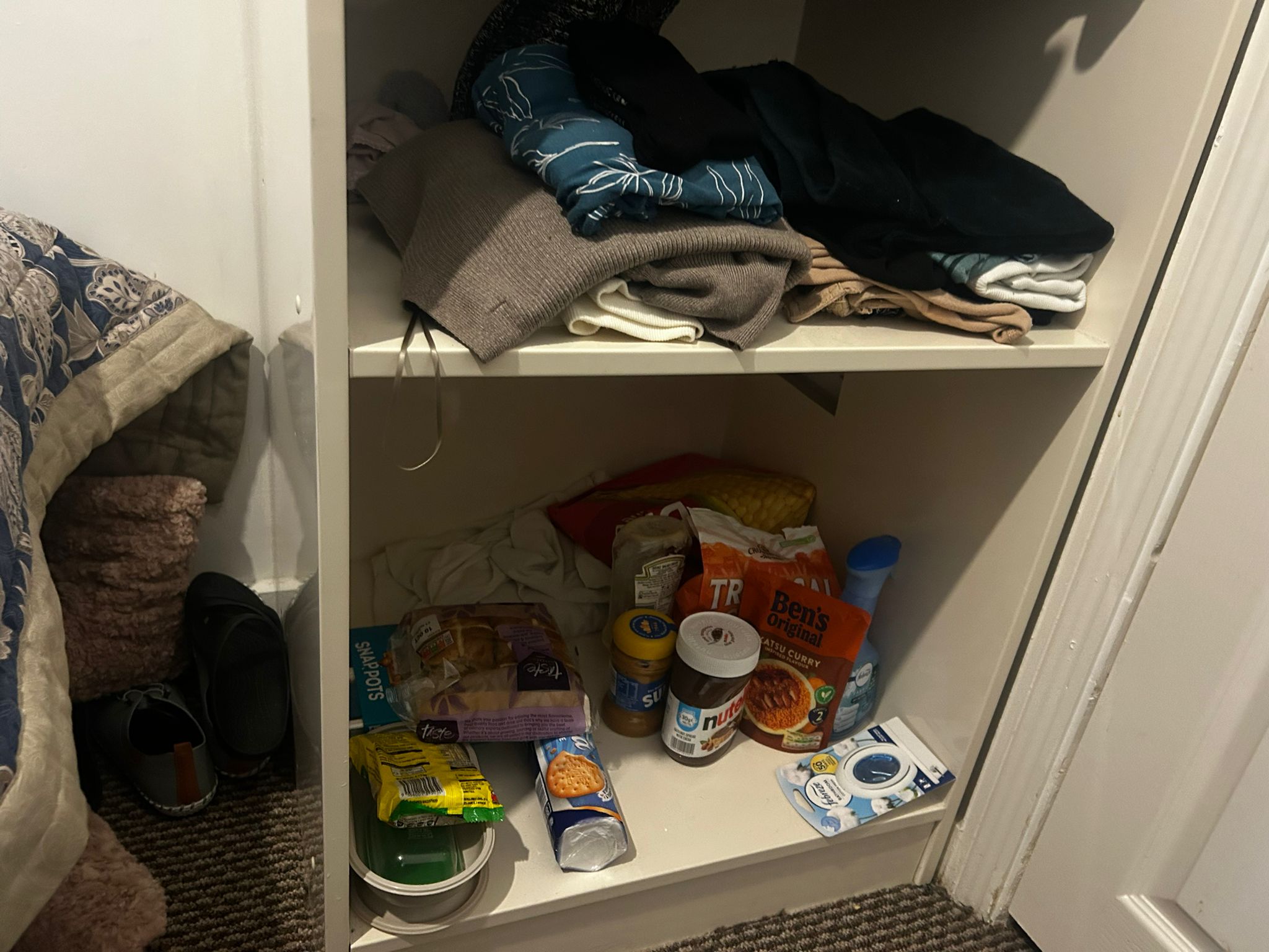Ms Curtis stores non-perishable food in the bottom of her wardrobe