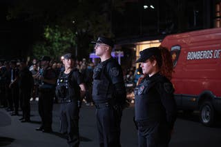 Police form a line outside the hotel where Liam Payne died on Wednesday night