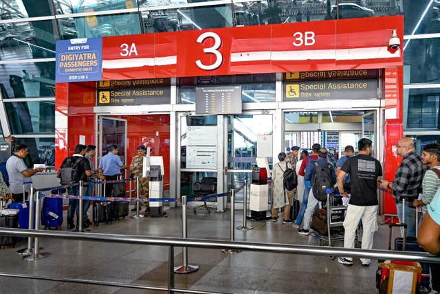 <p>Flight passengers align at security check points in the Indira Gandhi International airport, New Delhi on 19 July 2024 </p>