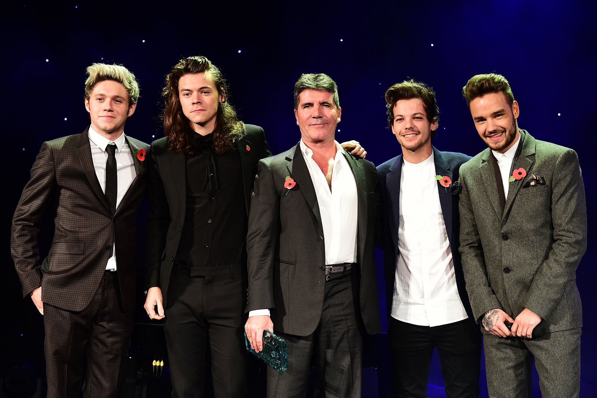 Liam Payne (right) with his bandmates and X Factor judge Simon Cowell (centre)