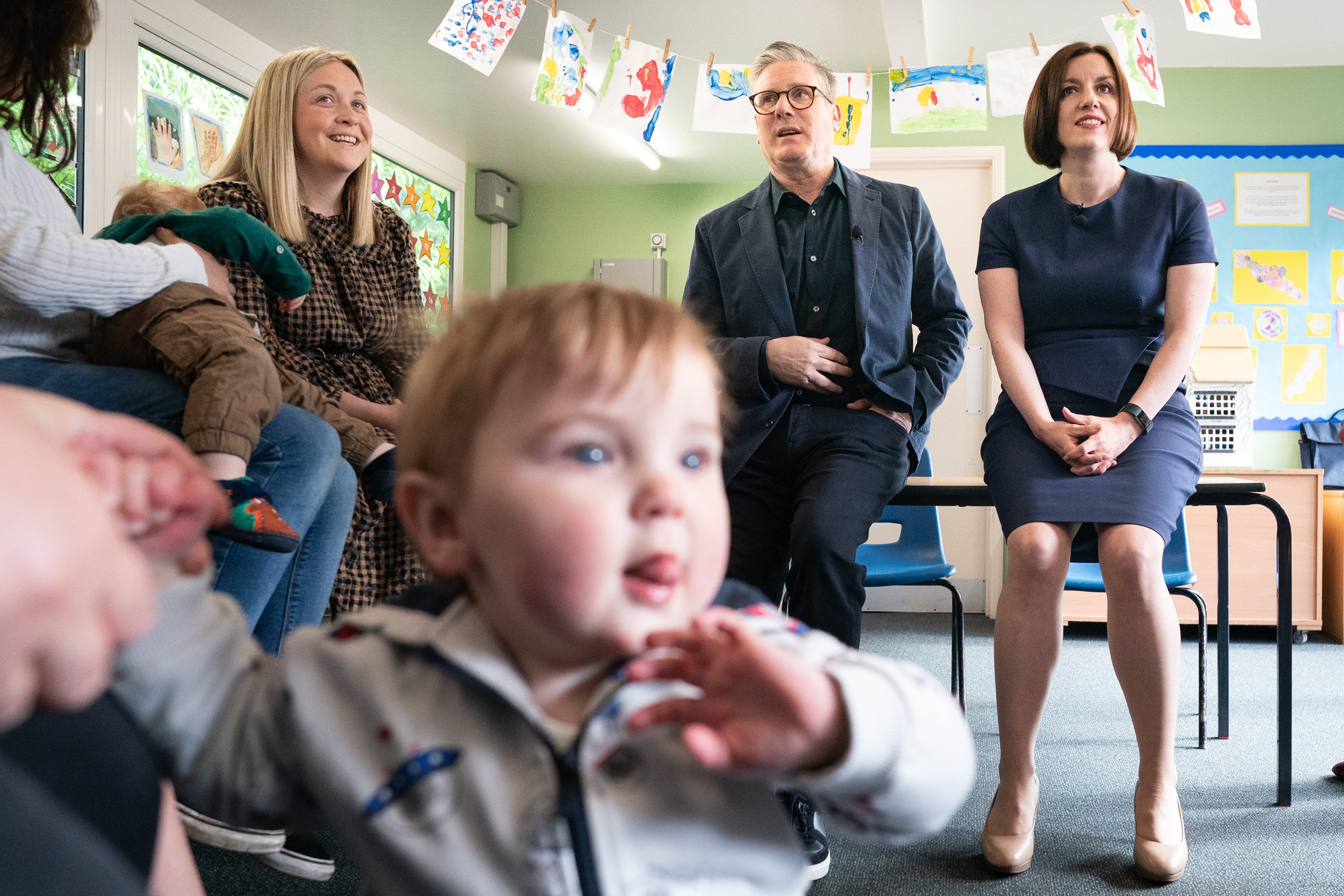 The expansion of funded childcare for working parents started being rolled out in England in April (Stefan Rousseau/PA)