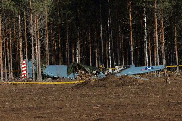 <p>A World War II-era airplane is seen after crashing minutes after takeoff, near the Rayskala aviation airfield</p>