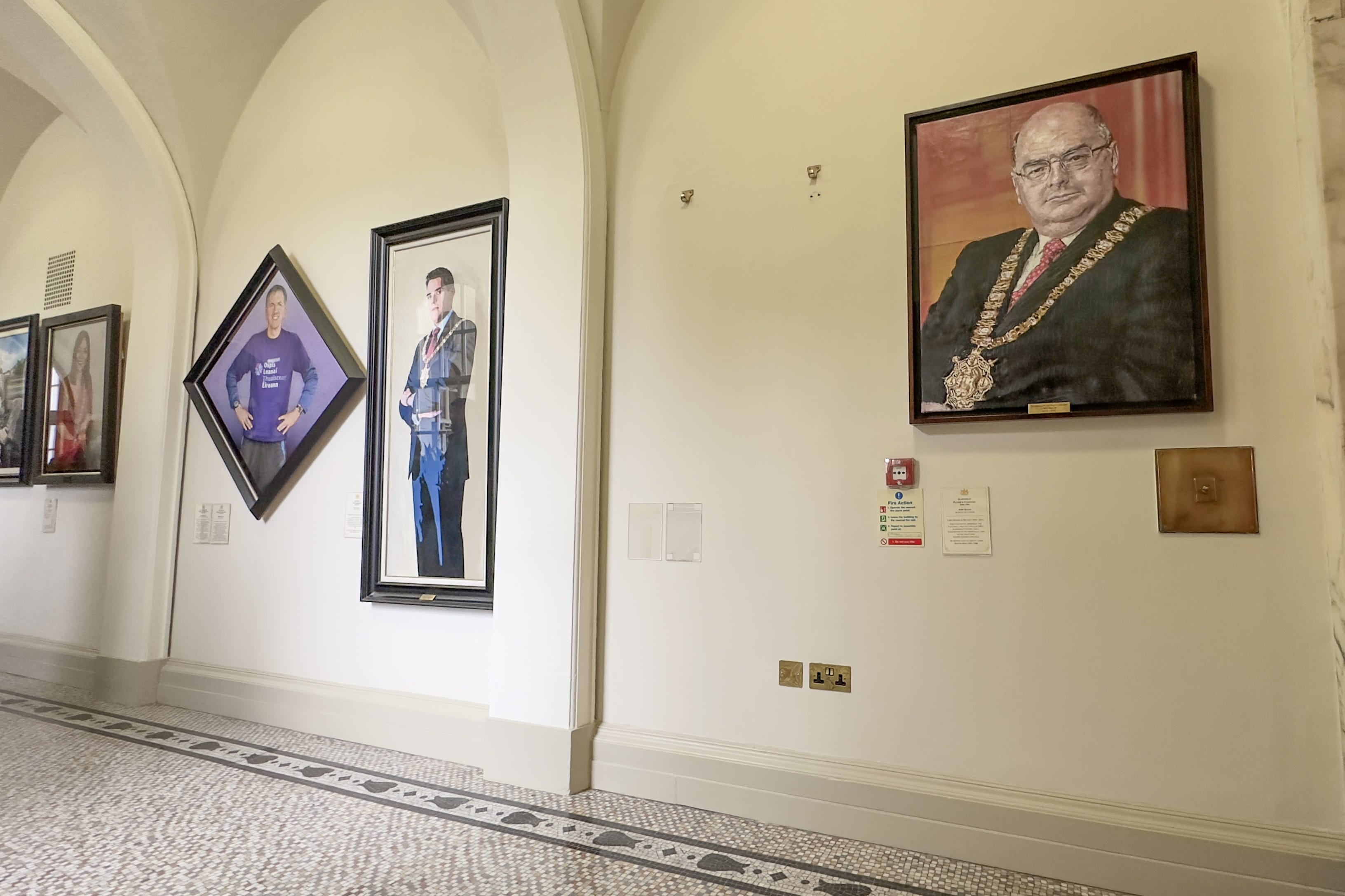 The empty space on the wall of Belfast City Hall, where the Lord Mayoral portrait of Niall O Donnghaile hung until it was removed on Thursday (Liam McBurney/PA)