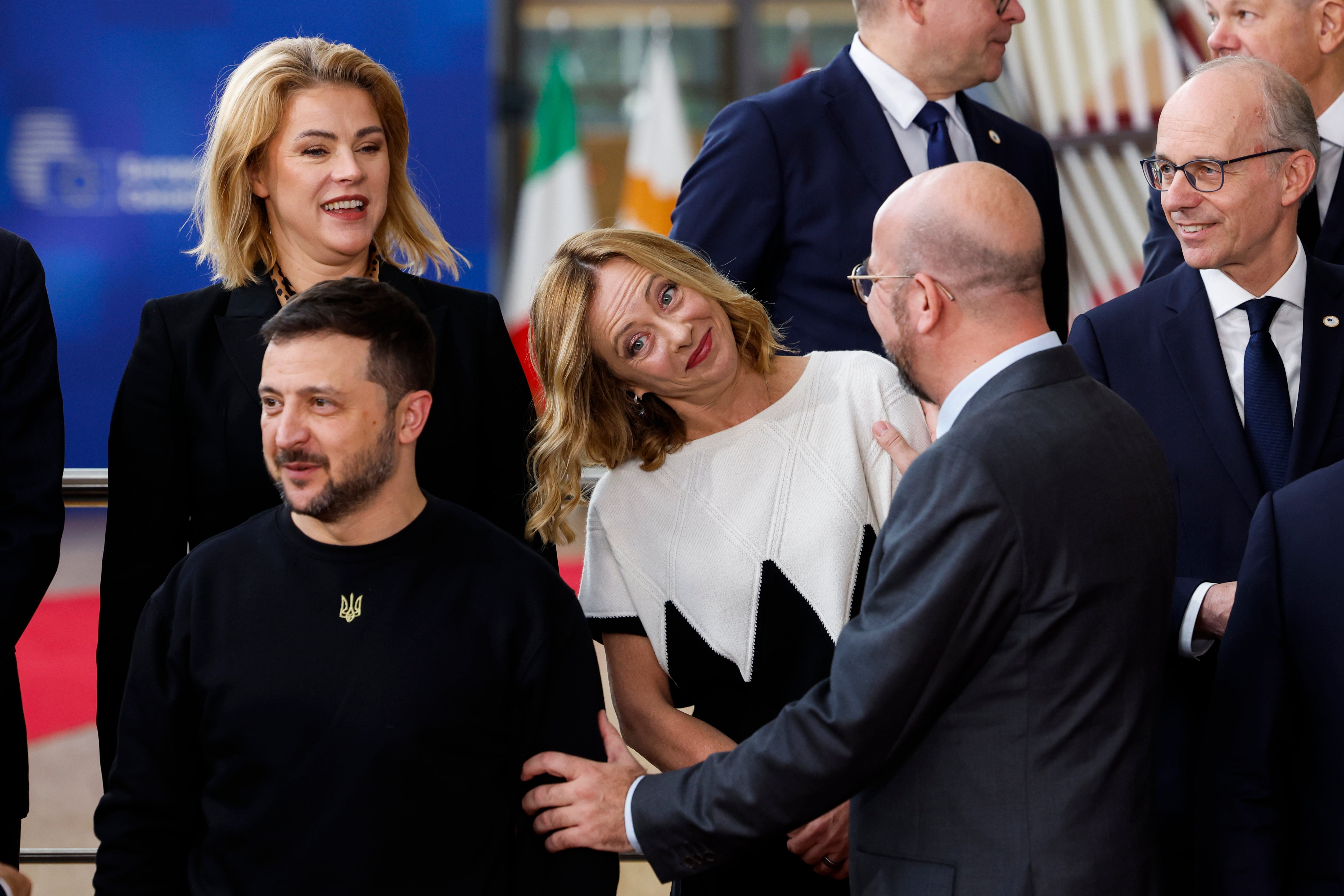 European Council President Charles Michel, second right, talks to Italy’s Prime Minister Giorgia Meloni