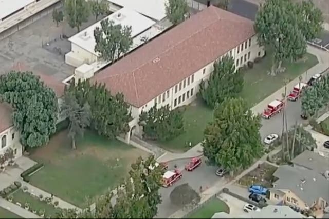 <p>Ambulances surround Walter Reed Middle School in Los Angeles, where 17 students got medical attention after being exposed to an unknown, possibly banned substance on October 17</p>