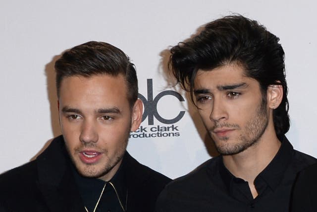 <p>Liam Payne and Zayn Malik attending the American Music Awards in 2014</p>