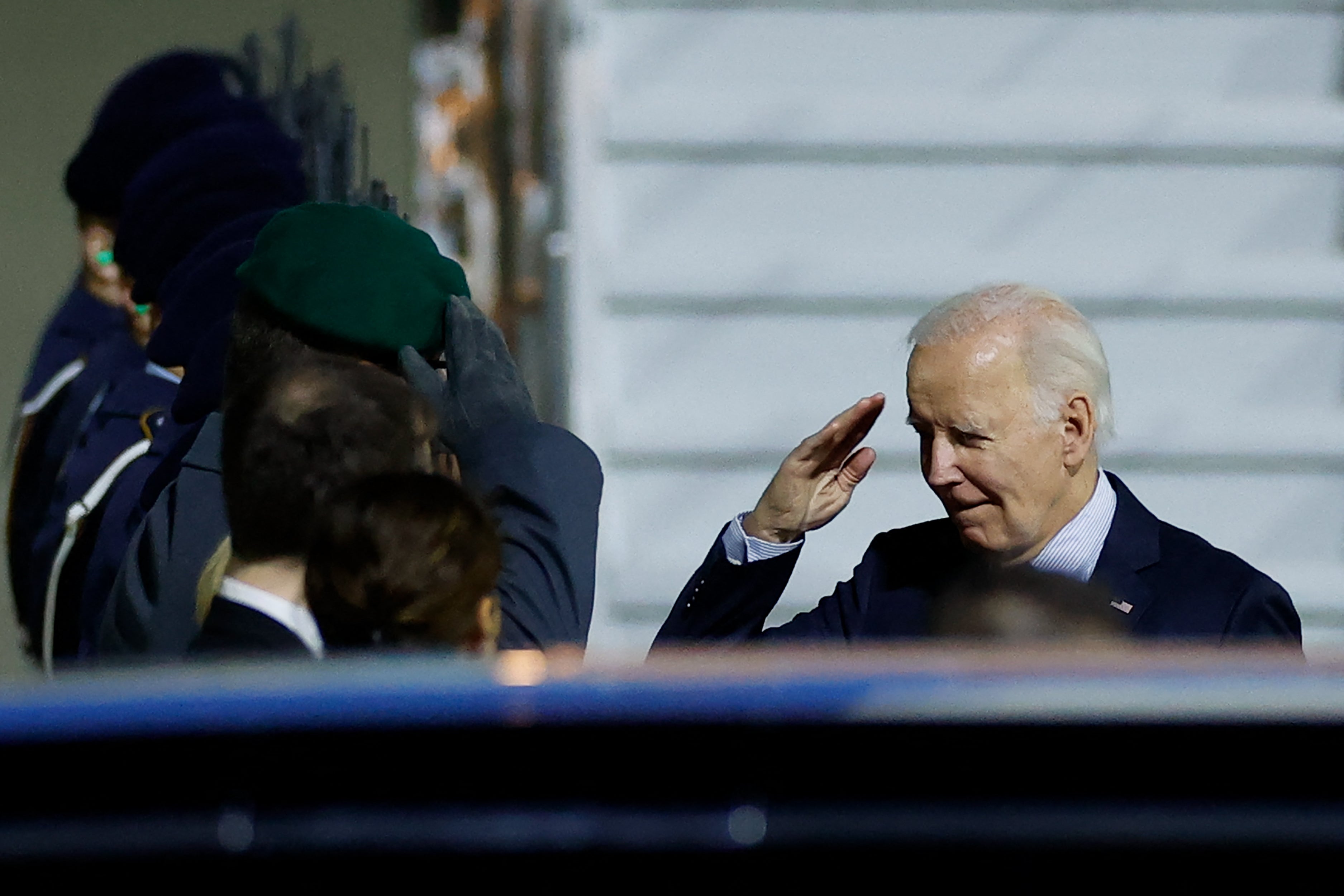 Biden salutes German soldiers after disembarking from Air Force One upon arrival at Berlin-Brandenburg Airport (BER).