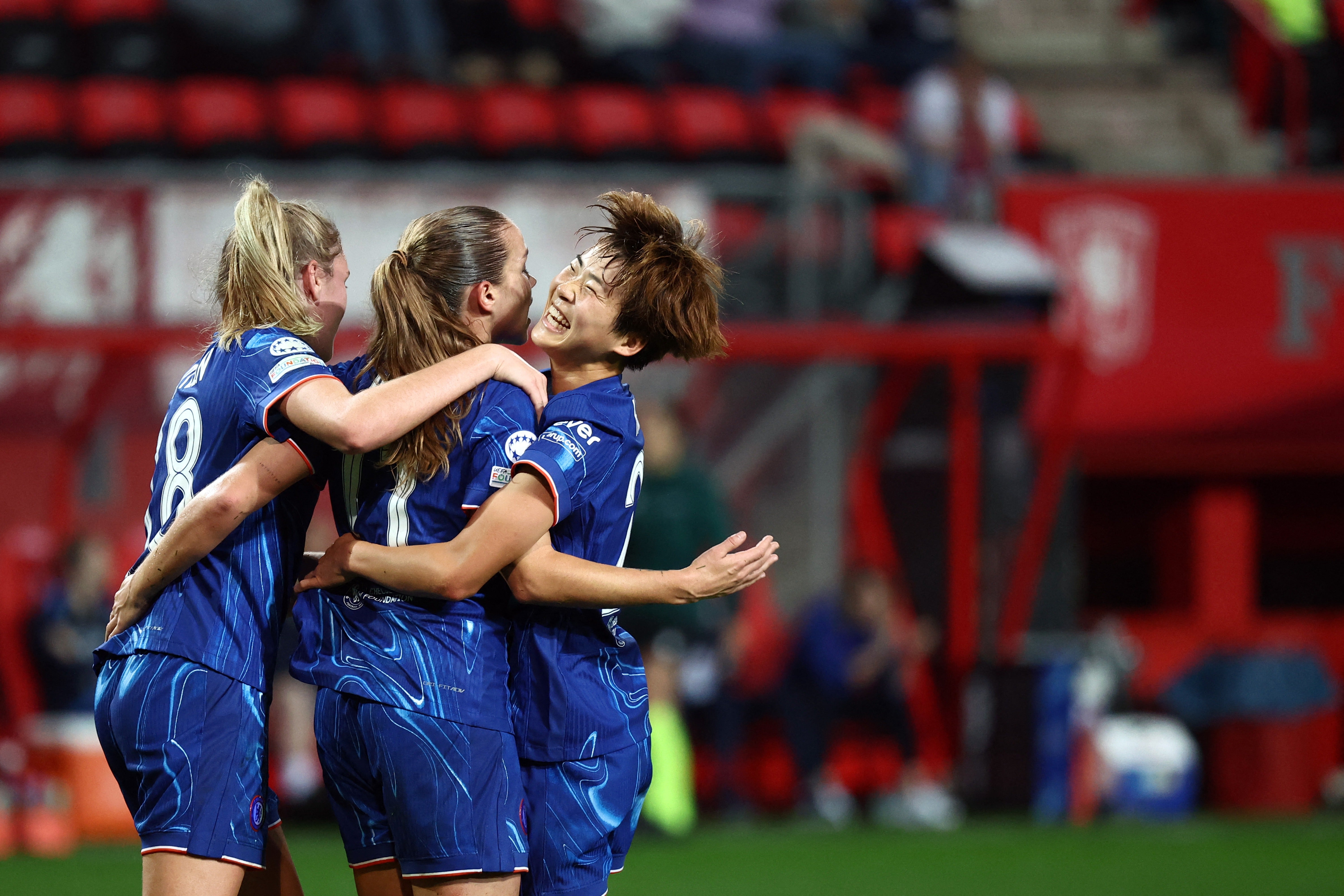 Chelsea's's Guro Reiten (C) celebrates scoring his team's third goal