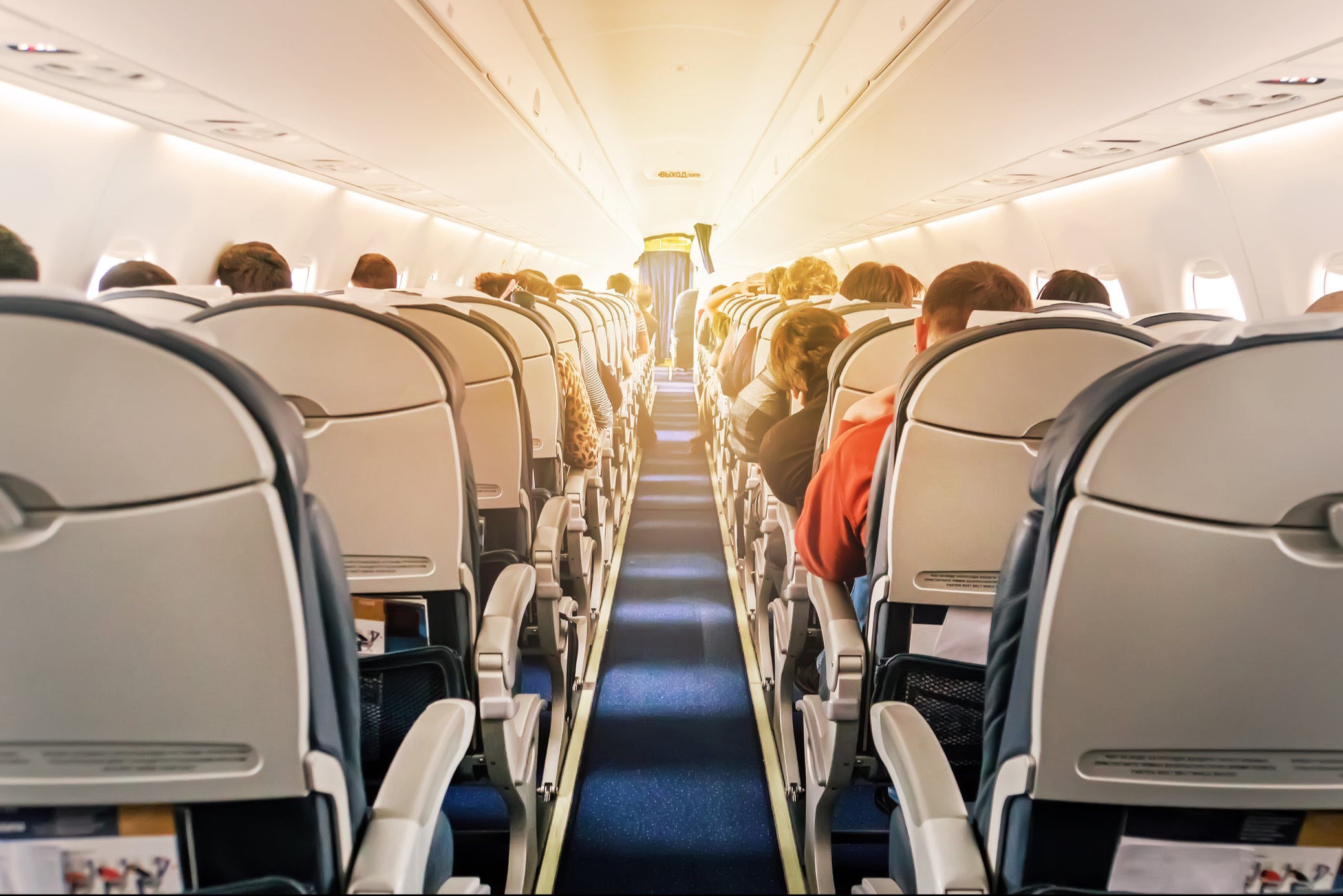 Debate: is performing a yoga routine on a plane ever acceptable?