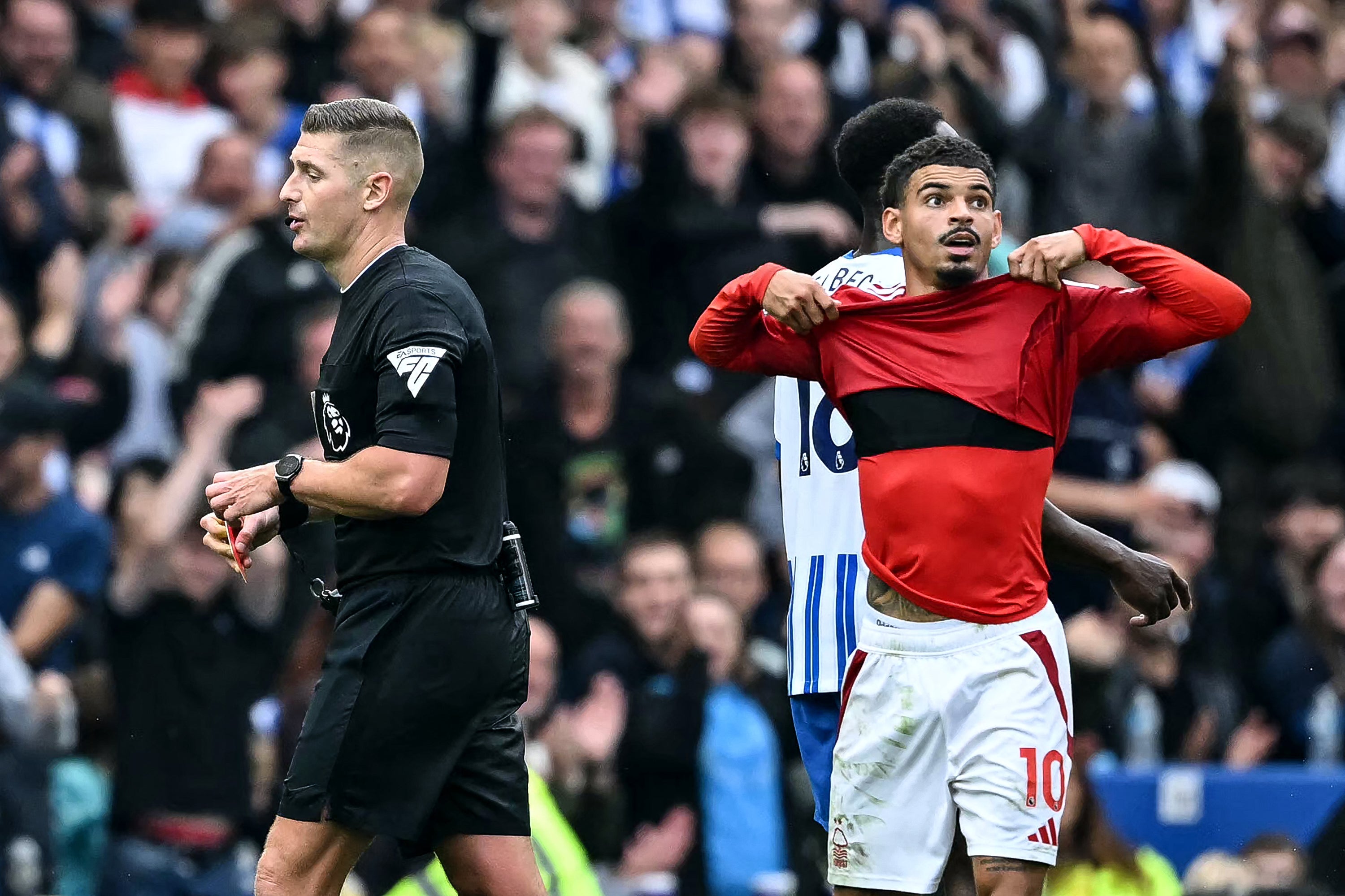 Morgan Gibbs-White reacts after being being shown a second yellow card by English Referee Robert Jones