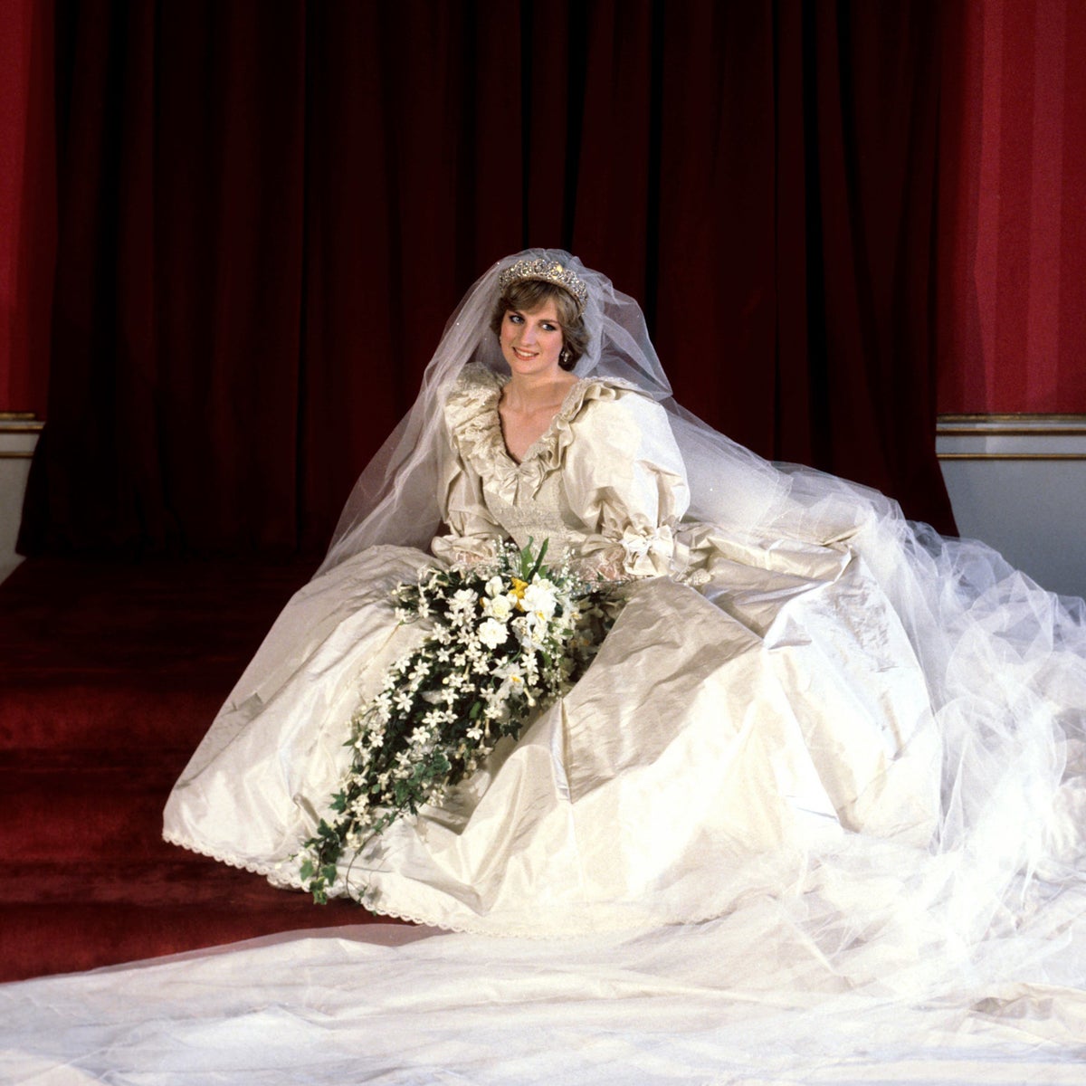 who designed princess diana's wedding dress Inside The Emotional Moment Emma Corrin Tried On Princess Diana's Wedding Dress