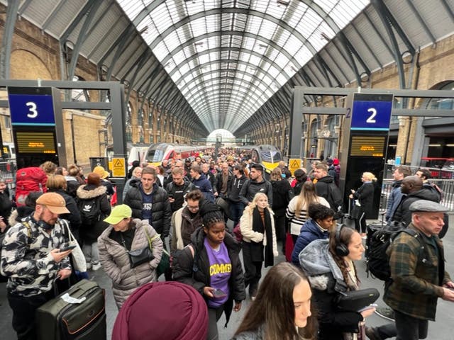 <p>More trains: Passengers at London King’s Cross station, hub for the East Coast Main Line, which will see additional journeys from December 2025</p>