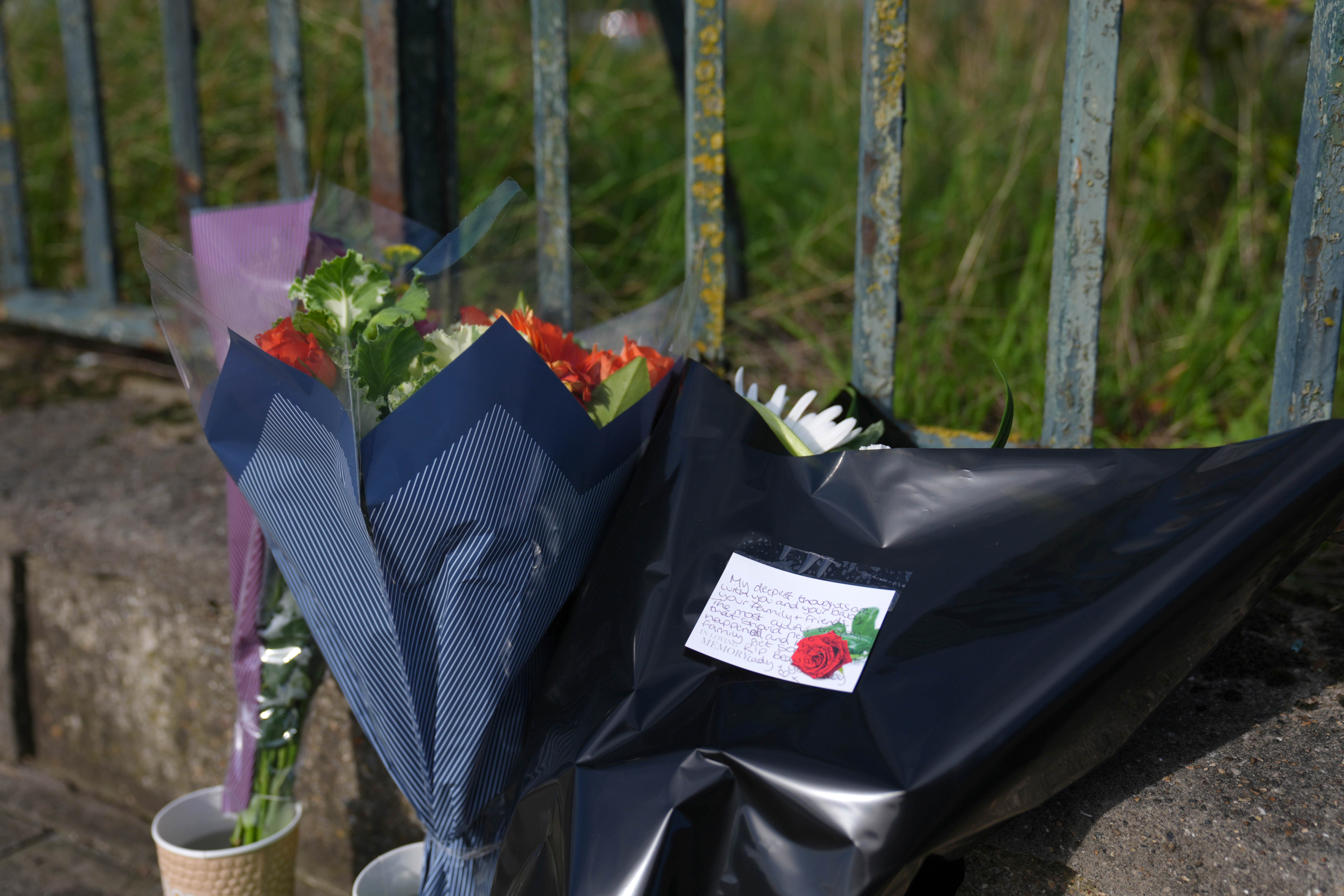 Flowers have been laid at the scene of the incident