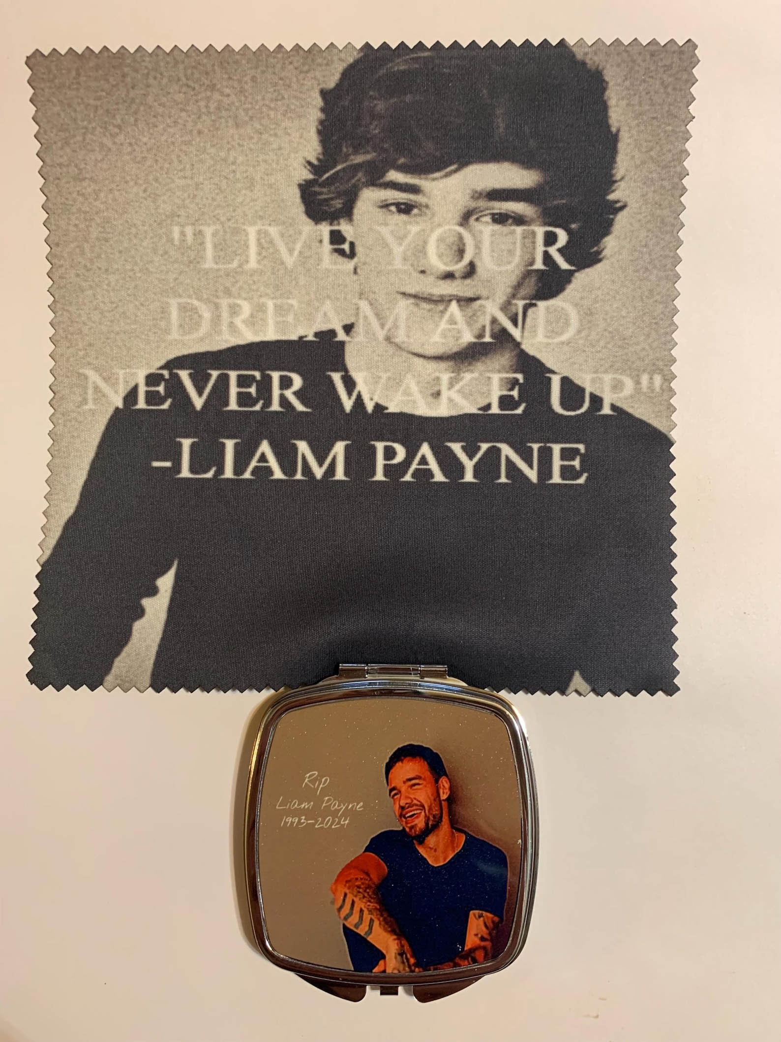 One seller has created memorial compact mirrors and glasses wipes.