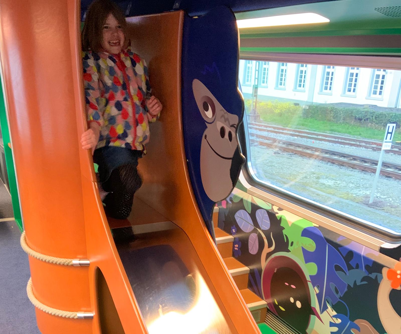  Anna Ableman, when aged six, in the play area on a Swiss train