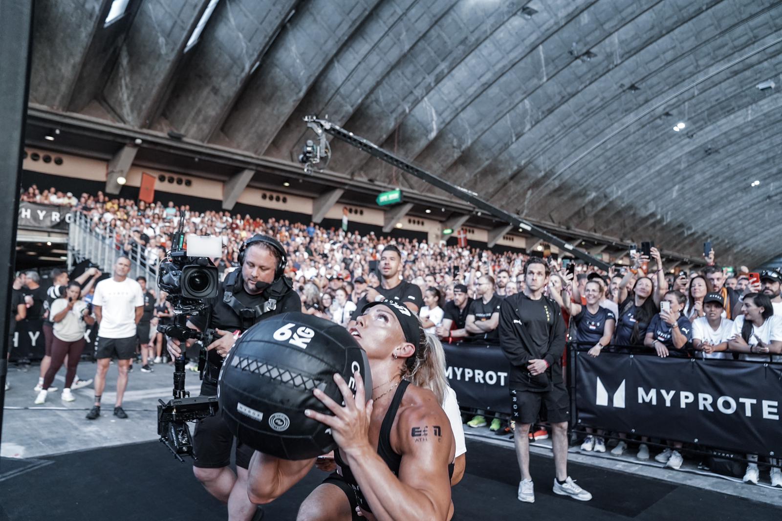 World champion Meg Jacoby working her way through the wall balls at the 2024 Hyrox World Championships in Nice