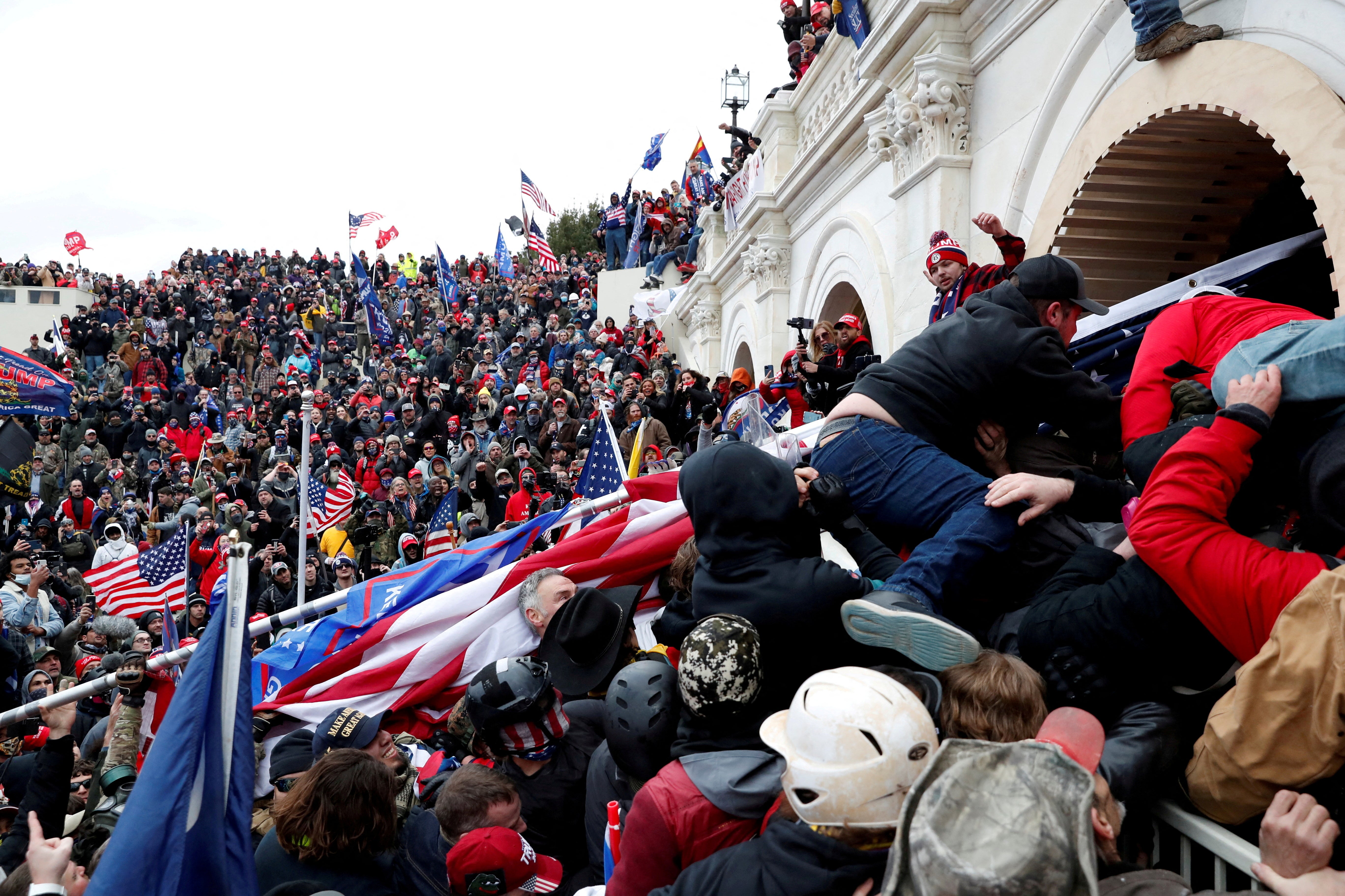 A mob of Donald Trump’s supporters break into the Capitol to disrupt the certification of the 2020 election on January 6, 2021.