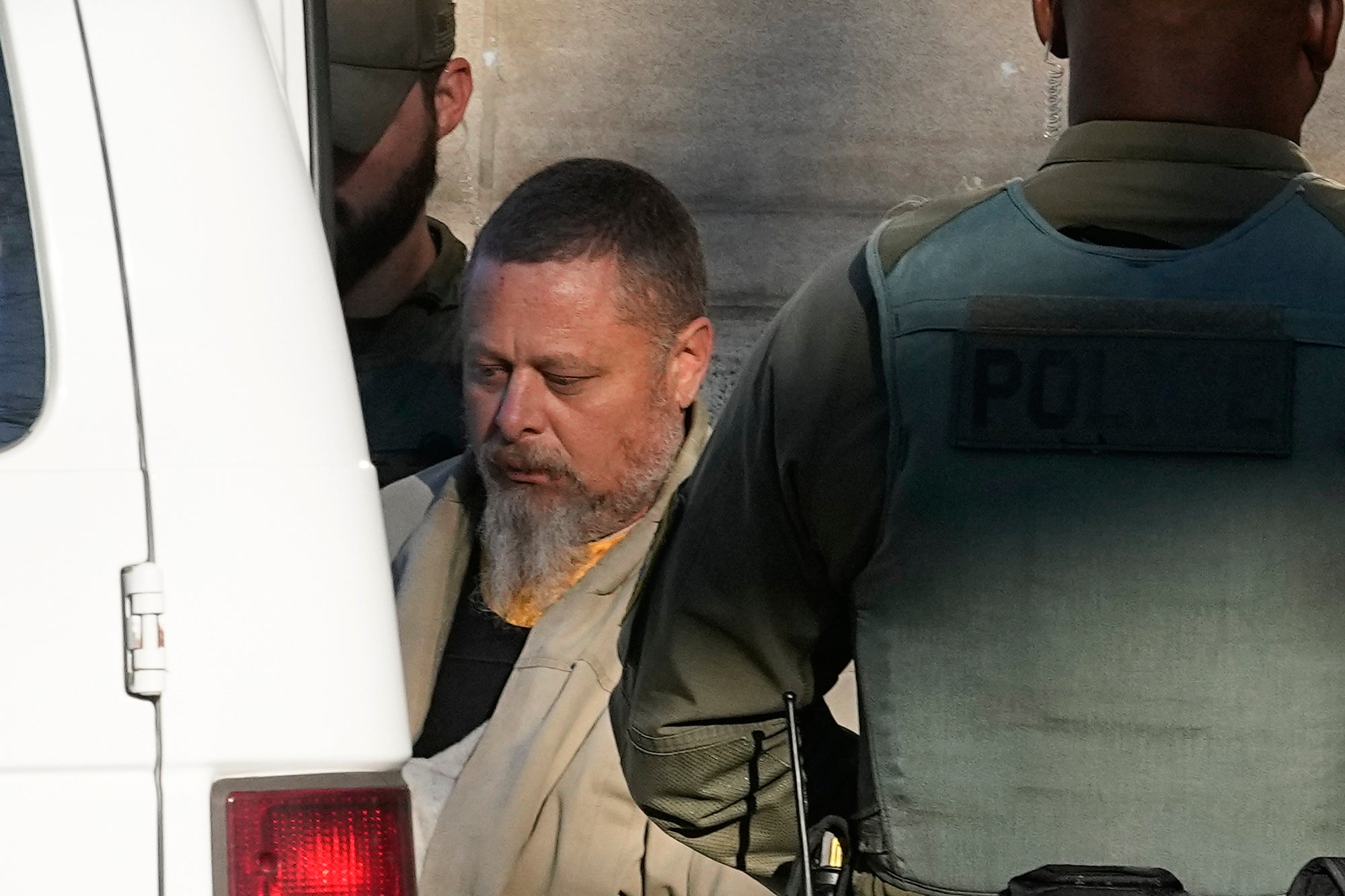 Officers escort Richard Allen out of the Carroll County courthouse following a hearing in November 2022