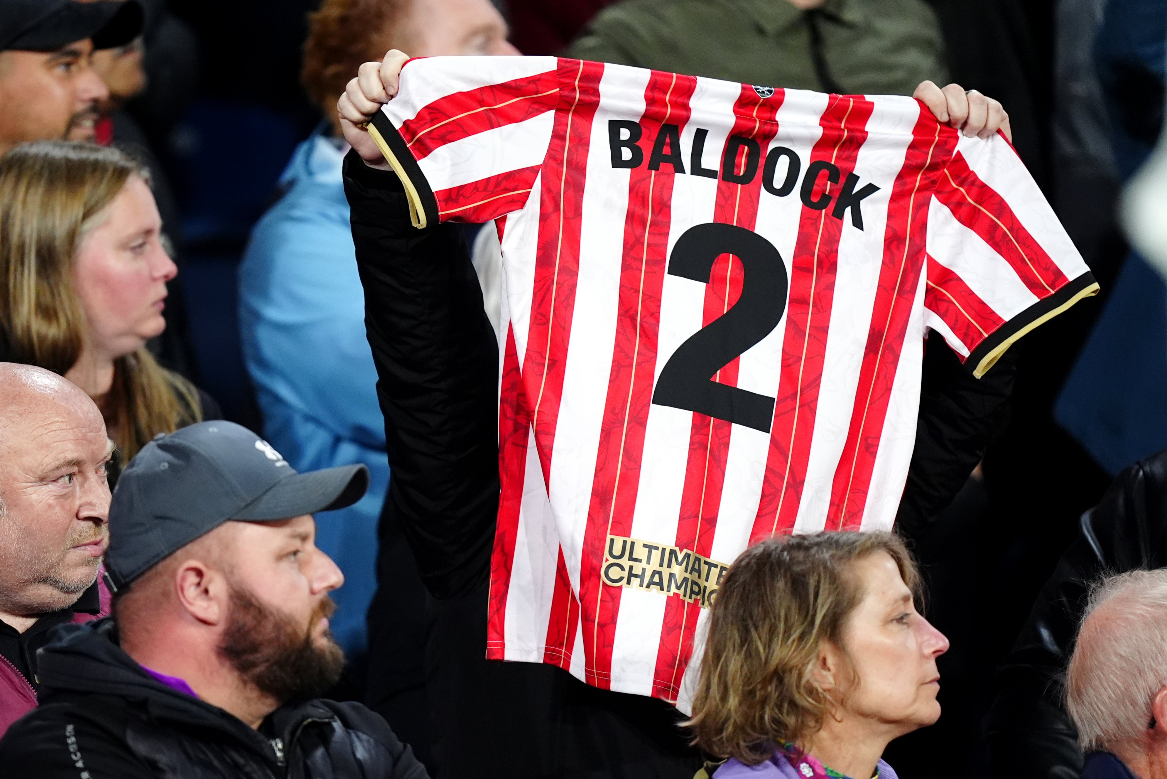 Jerseys bearing George Baldock's name were held up by Sheffield United fans