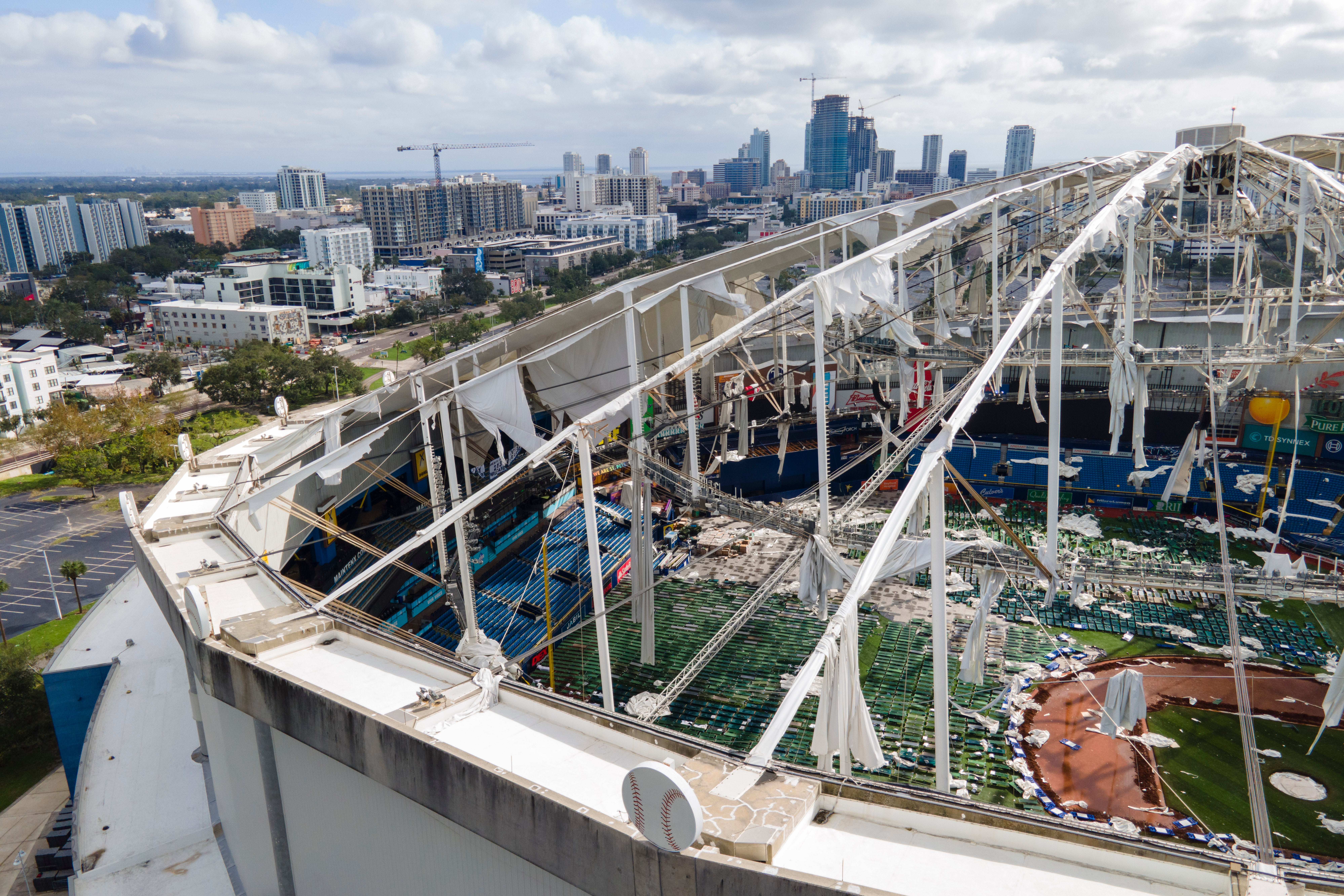 The roof of the Tropicana Field is damaged the morning after Hurricane Milton hit St. Petersburg, Florida. The field is the home of the Tampa Bay Rays baseball team